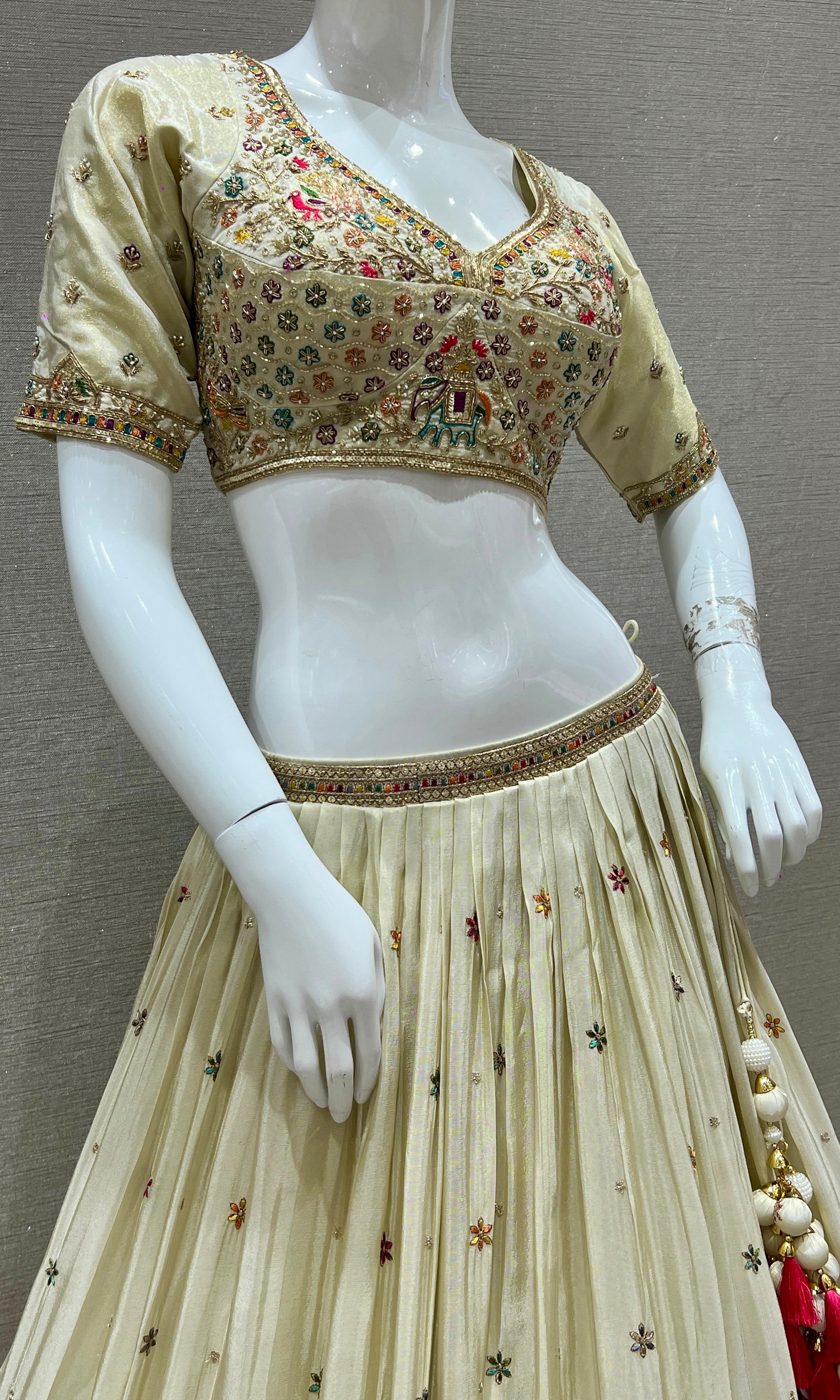 Vanika Vaatika – Cream Lehenga with Floral and Animal Embroidery Thread Work
