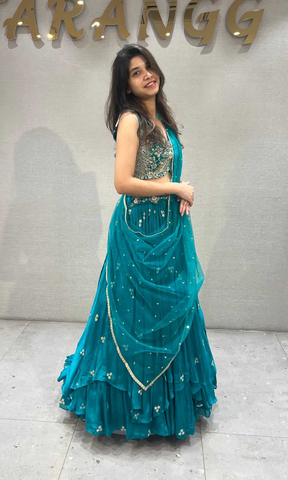 Teal blue gold zari embroidered lehenga