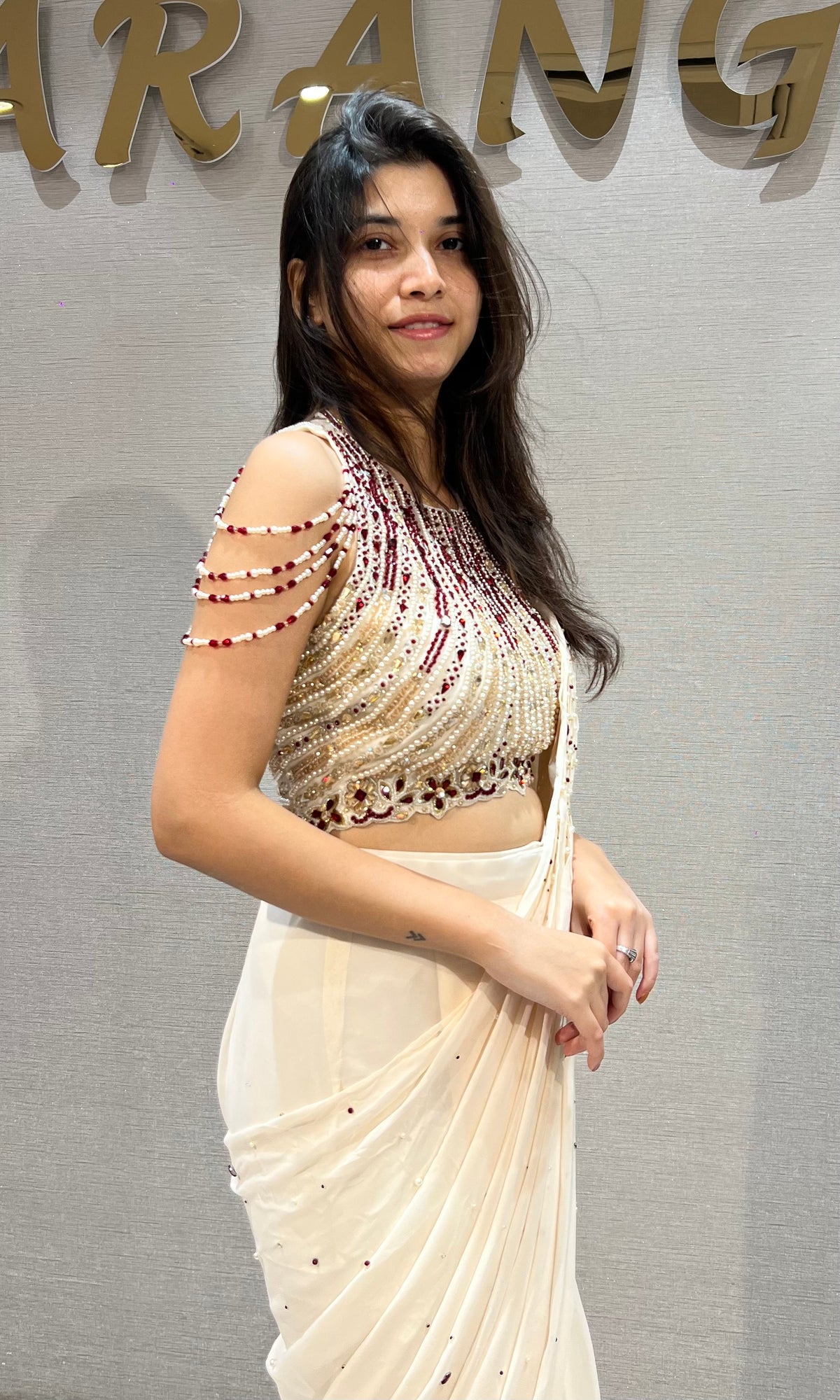 Cream Georgette Saree with Beaded Halter Blouse