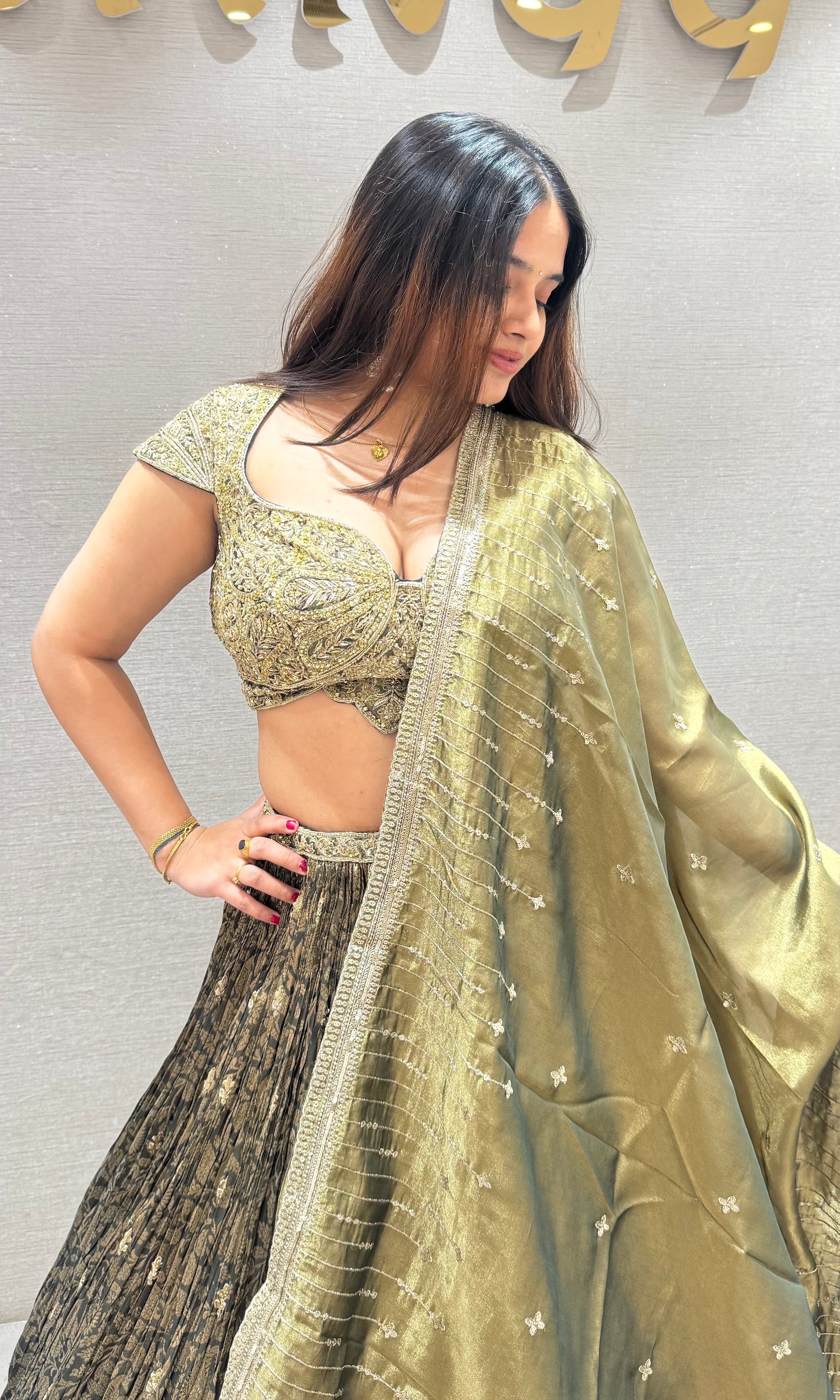 Emerald green crushed lehenga with tissue gold