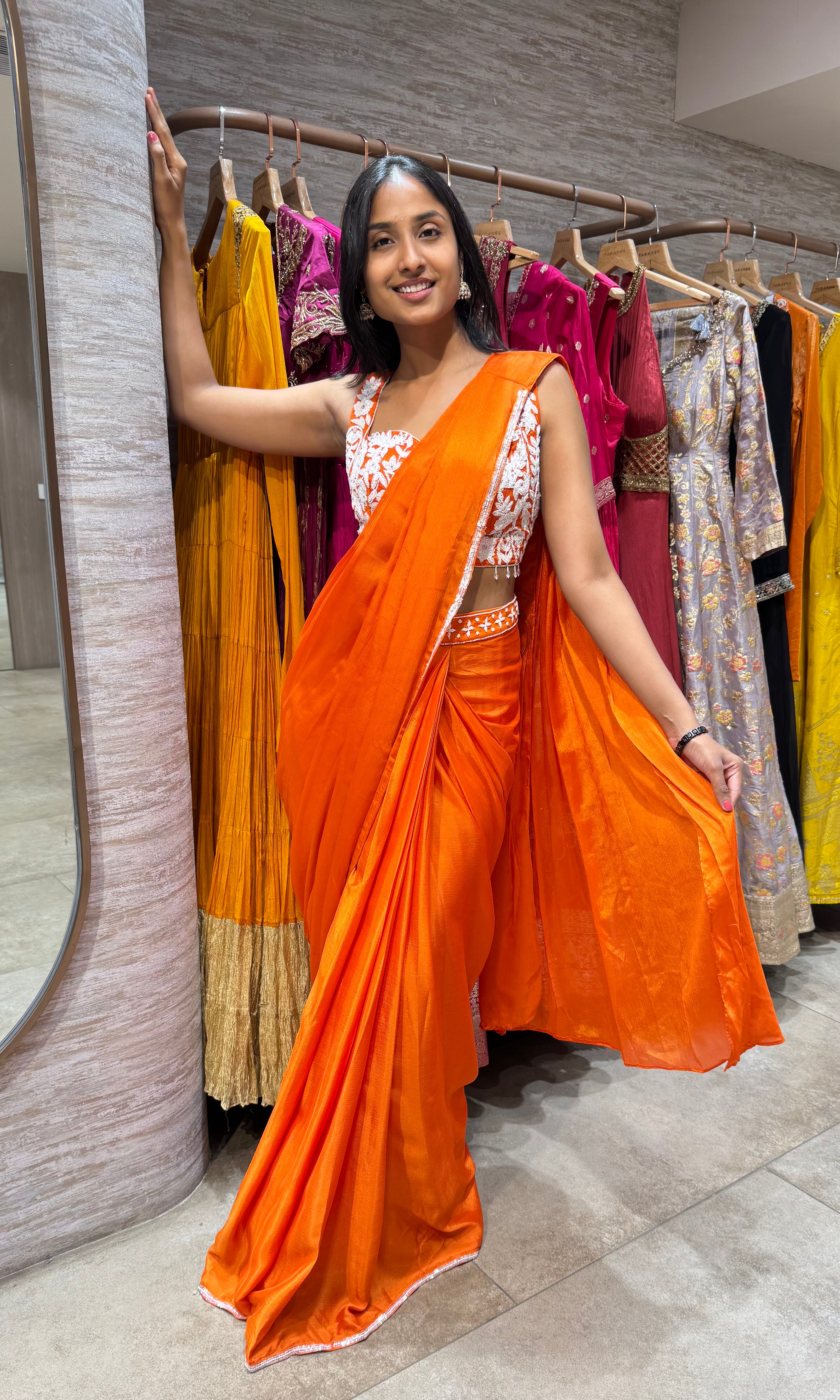 ORANGE DRAPE SAREE WITH CORSET BLOUSE