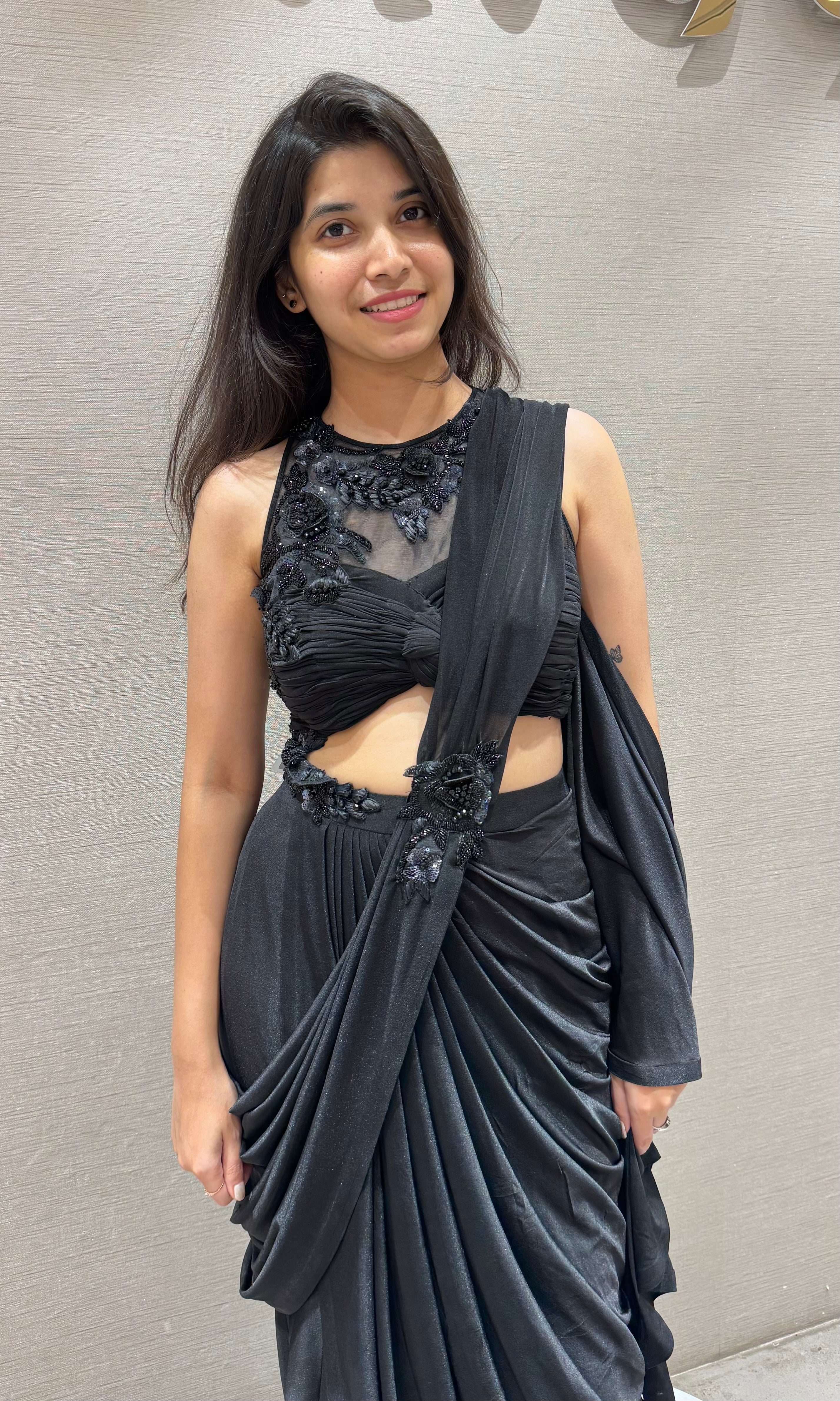 Black drape saree with halter neck blouse