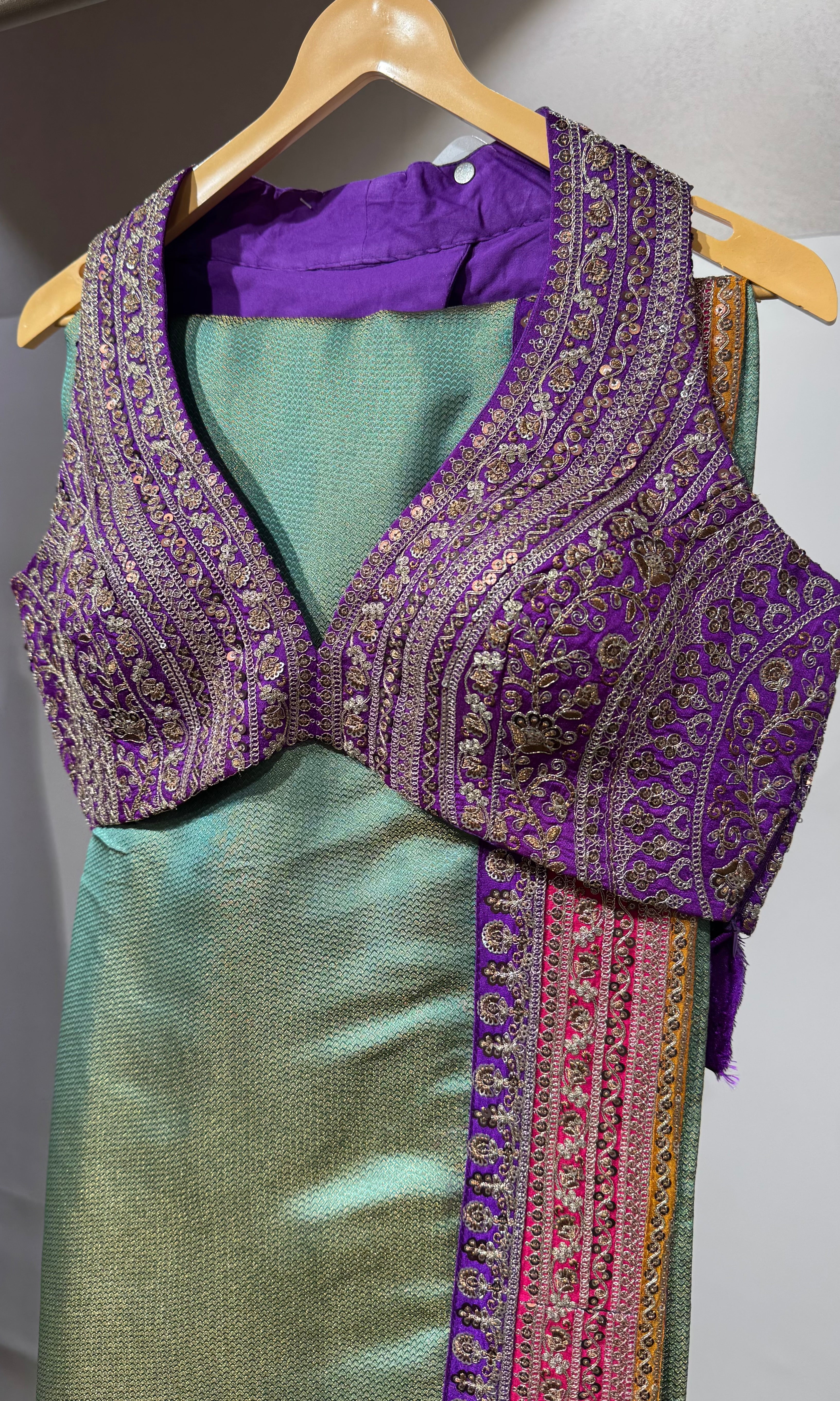 Green saree with embroidered blouse