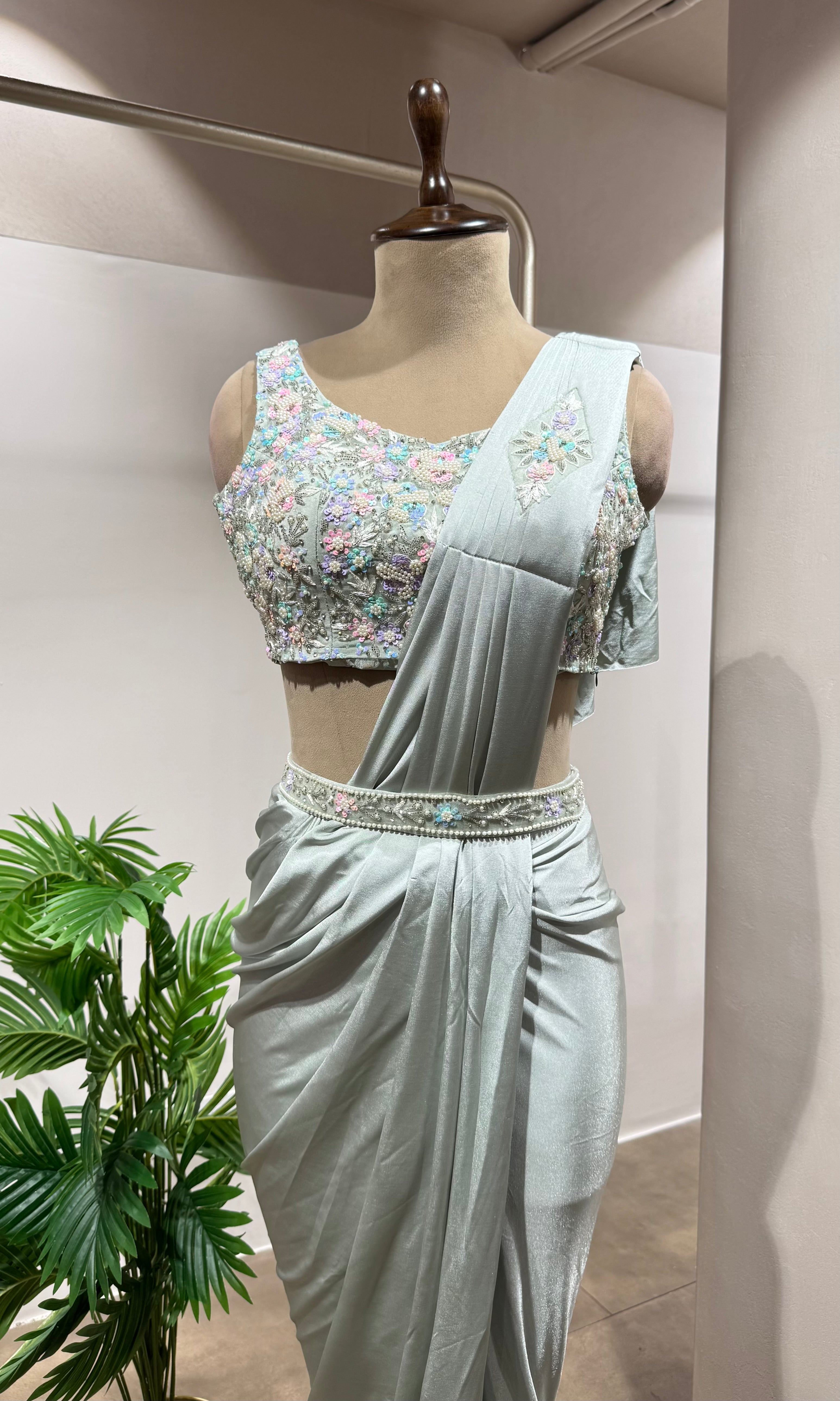 GREEN DRAPE SAREE WITH EMBELLISHED BLOUSE