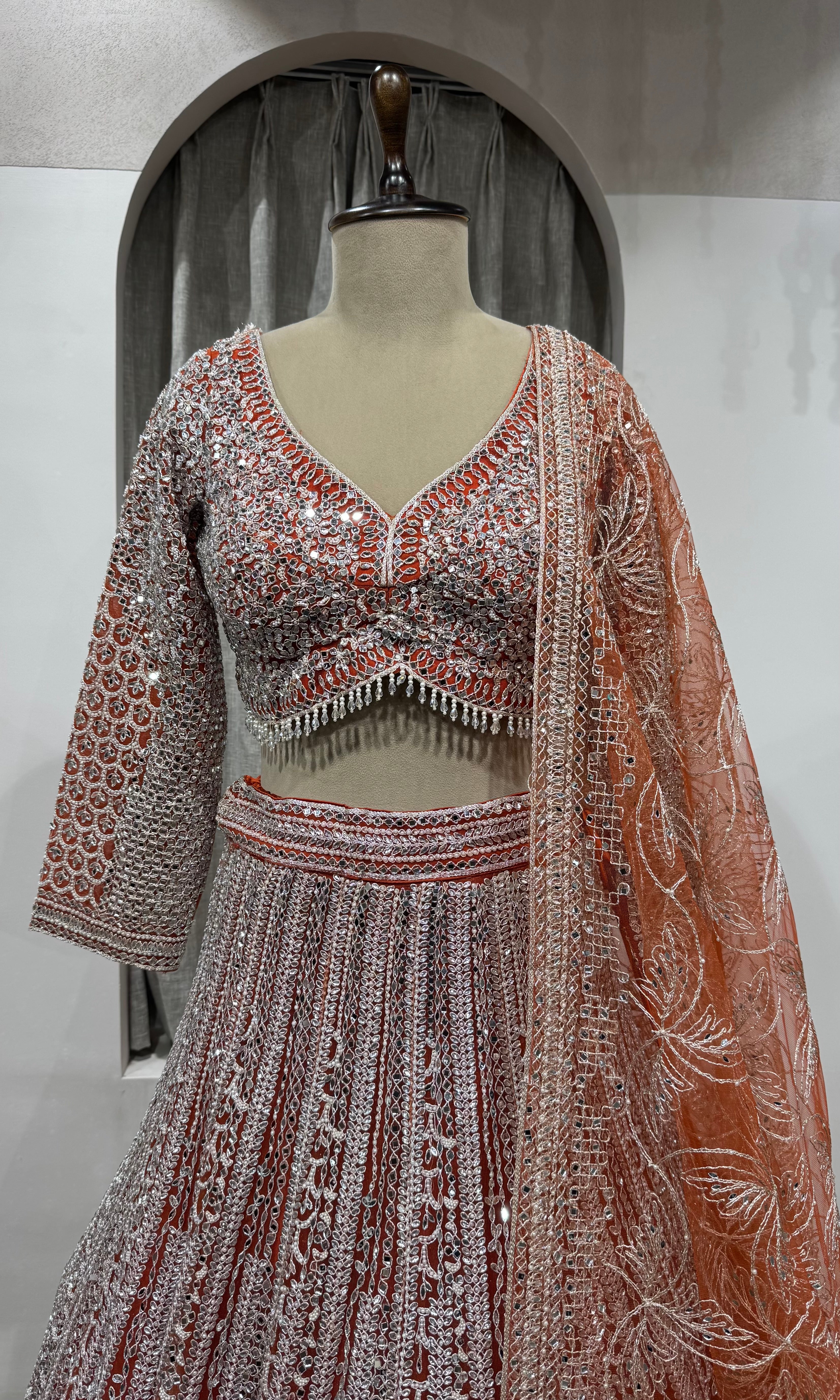 Rust and grey heavy bridal lehenga