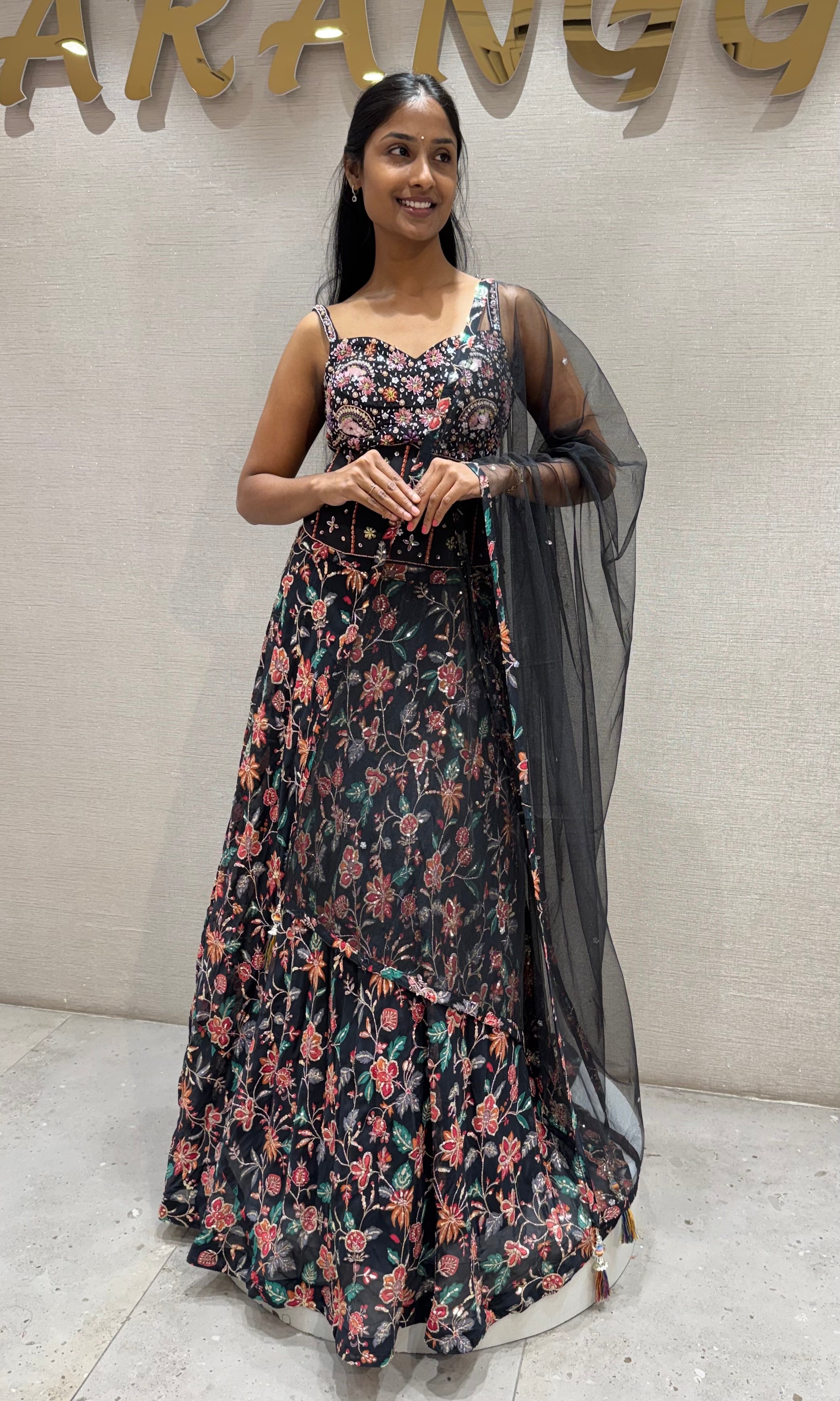 black floral printed lehenga set with corset blouse