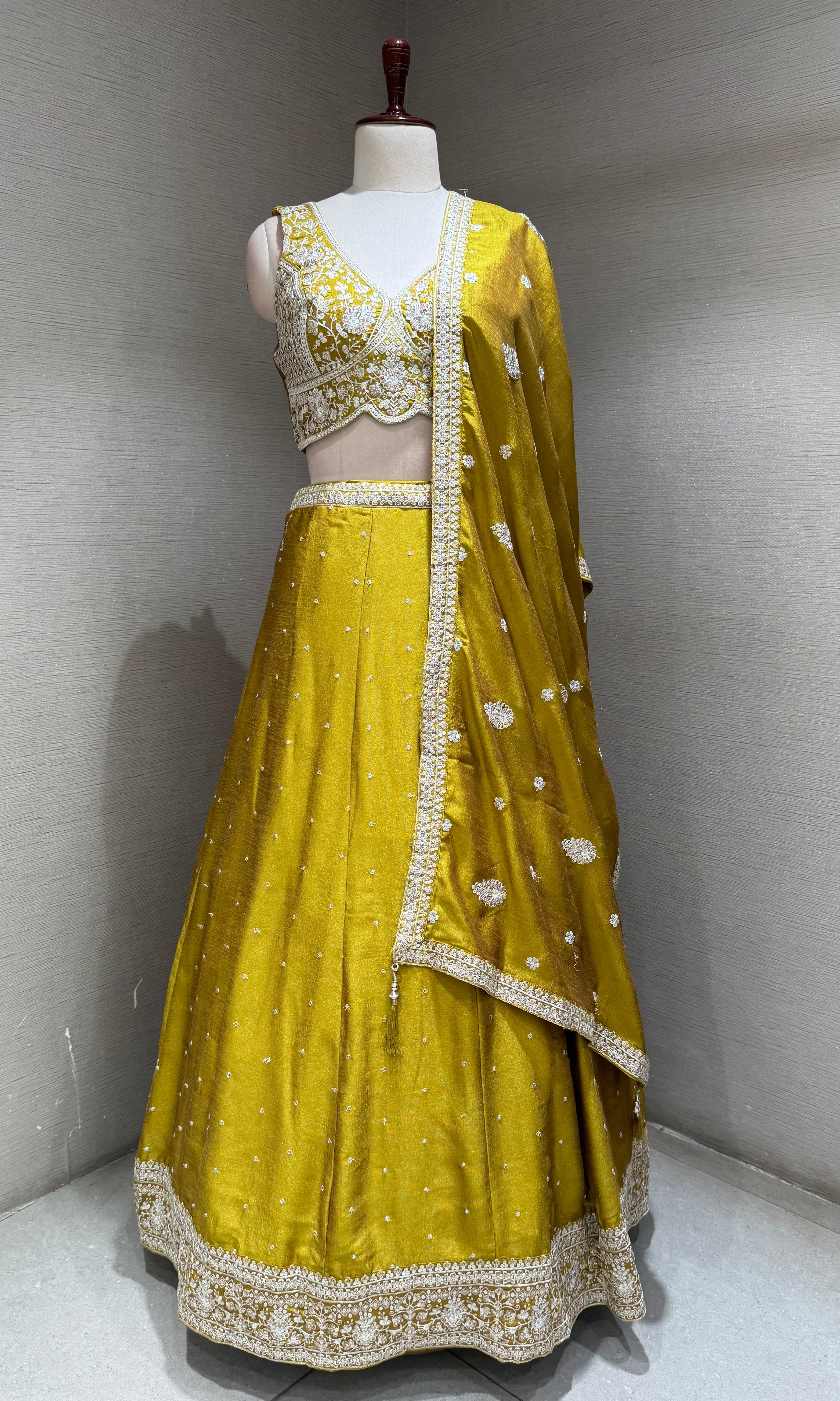 Green Silk Lehenga Choli with Embroidered Dupatta