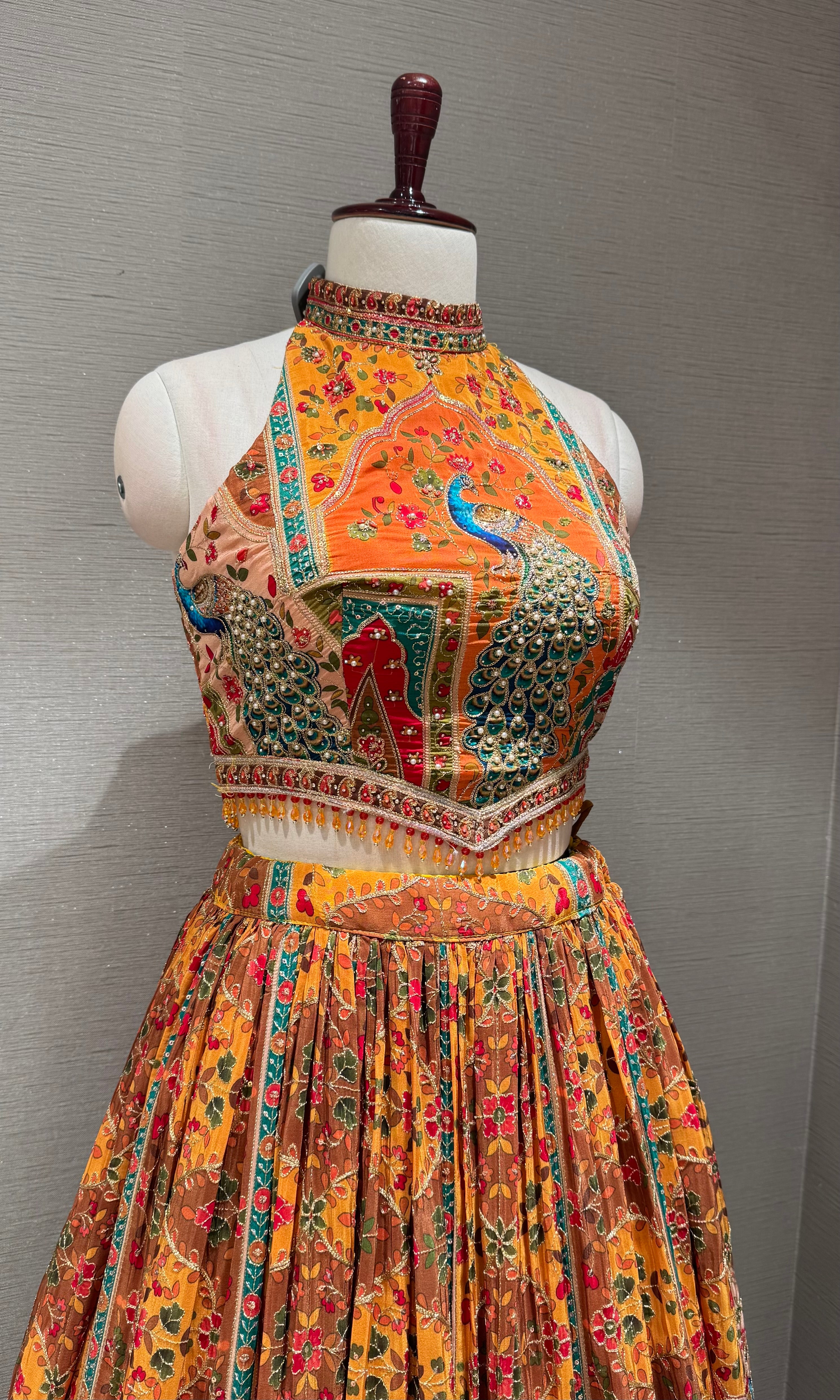 Mustard Mayur Pichwai halter neck Lehenga set