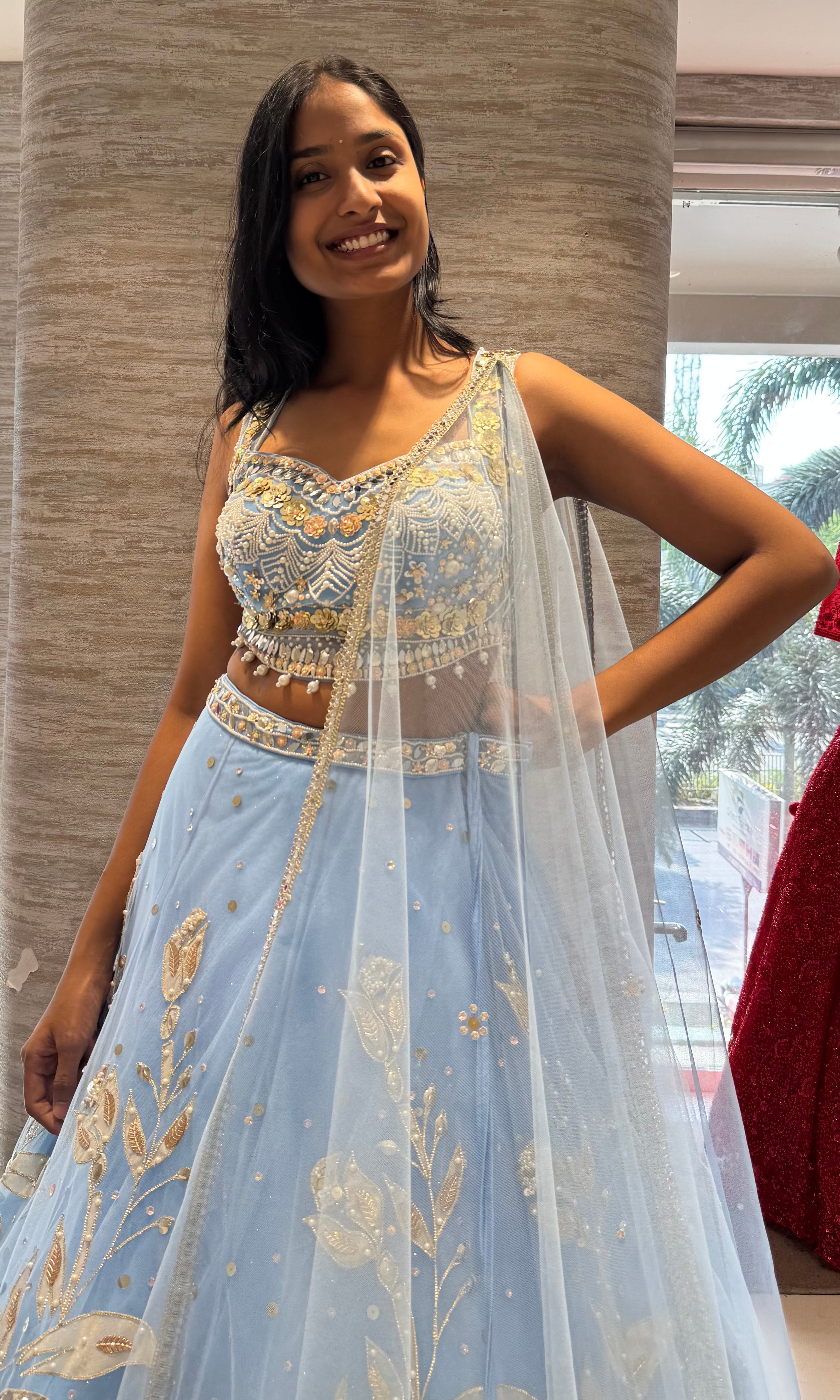 Light blue heavy gold embroidery lehenga