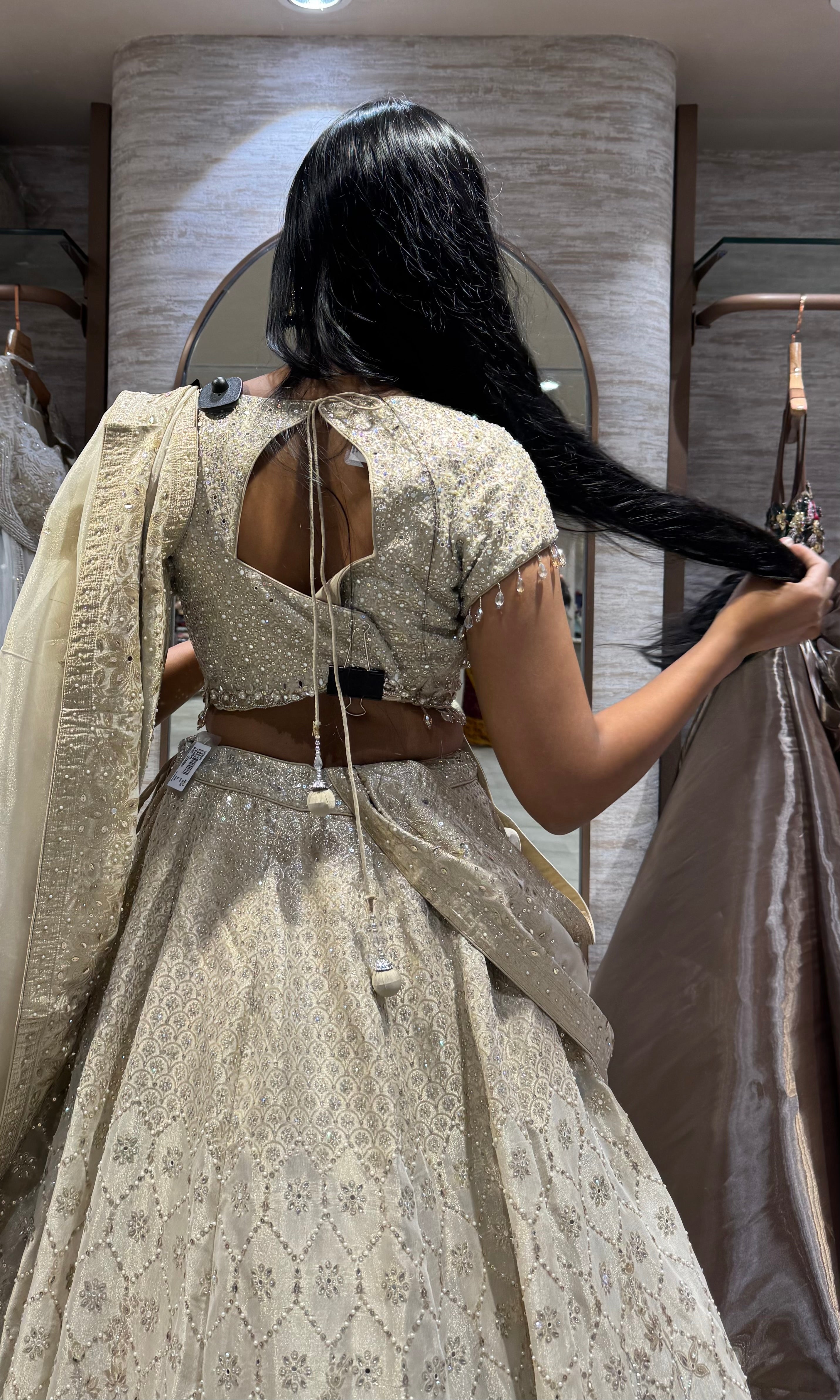 Gold intricate silver embroidery lehenga