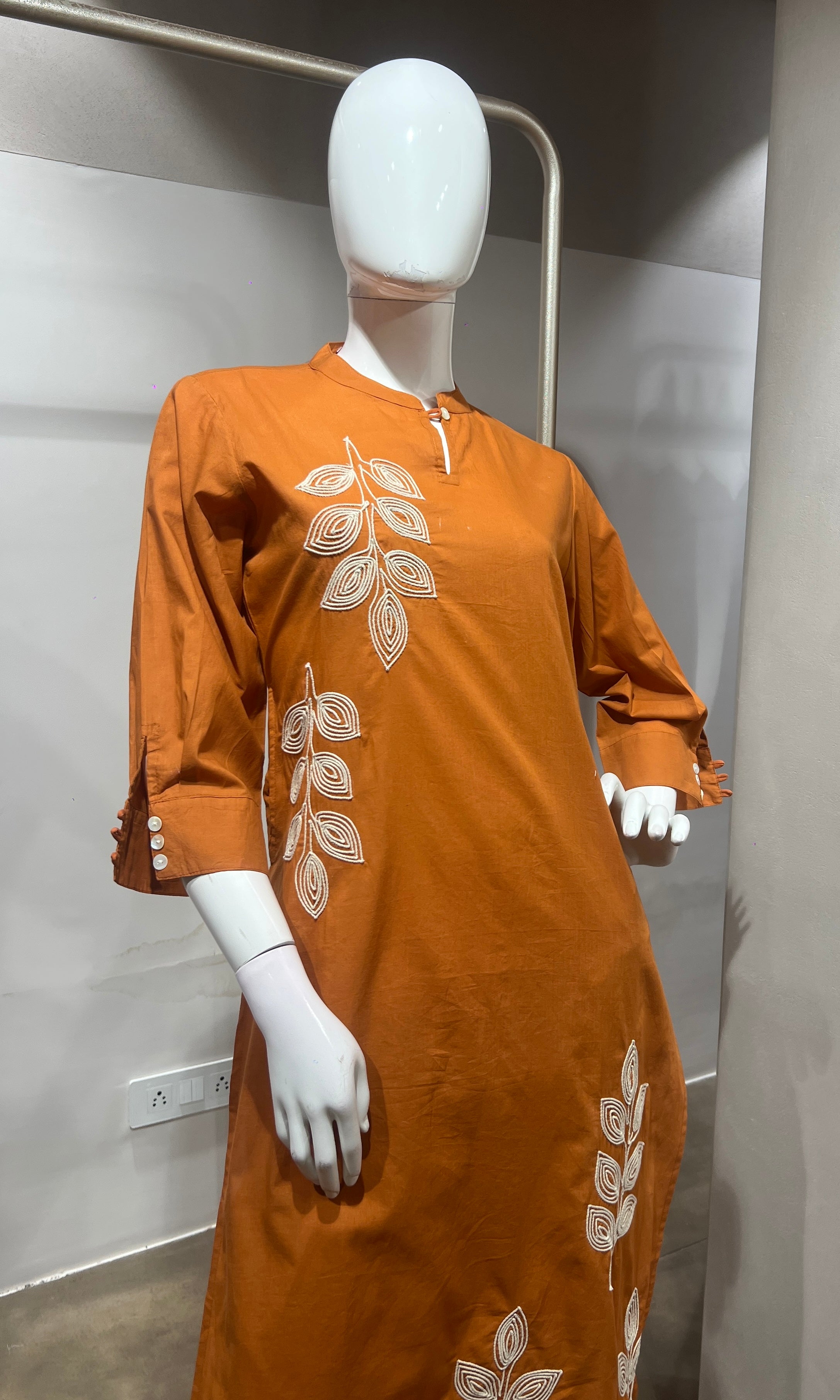 Orange leaf cotton kurta set with tassal dupatta