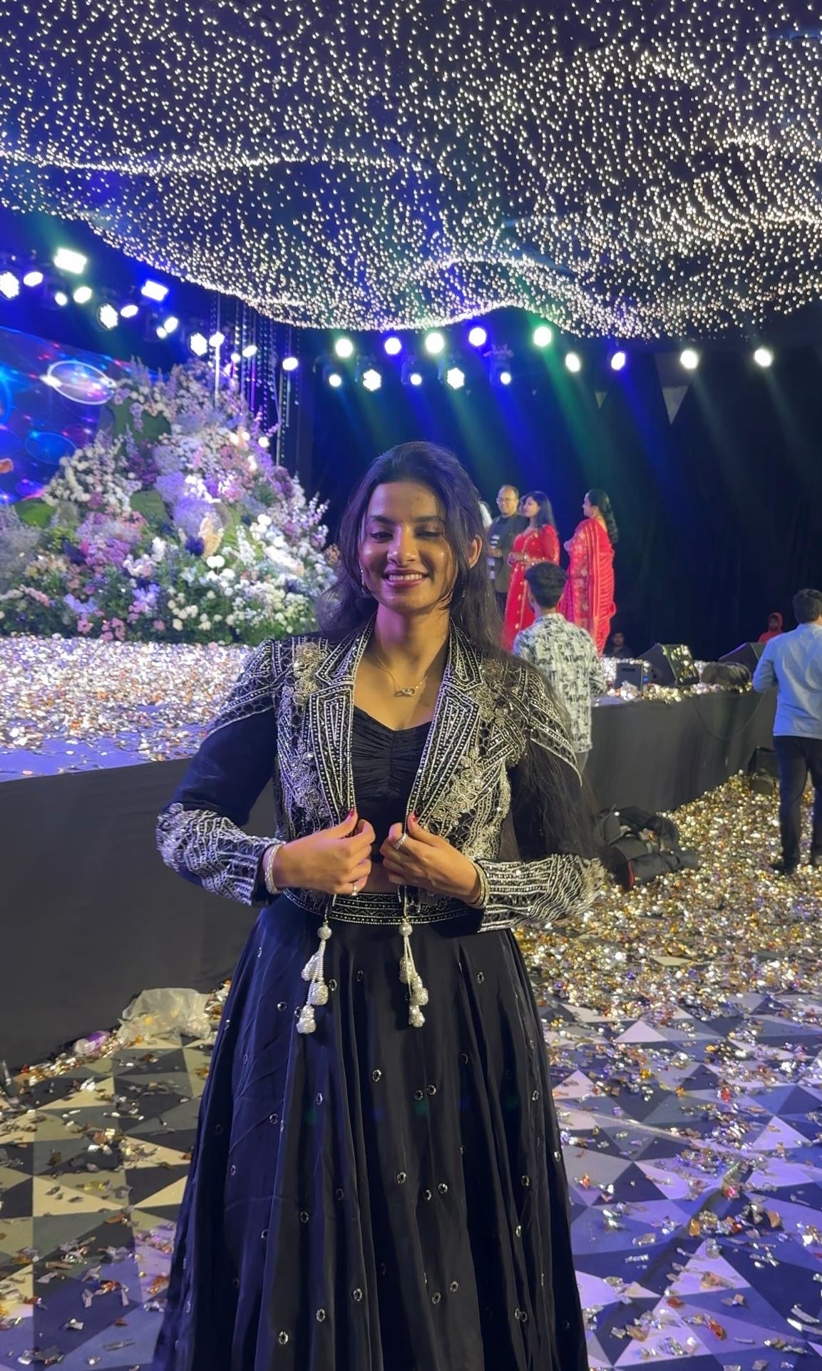 Black lehenga with corset blouse and jacket