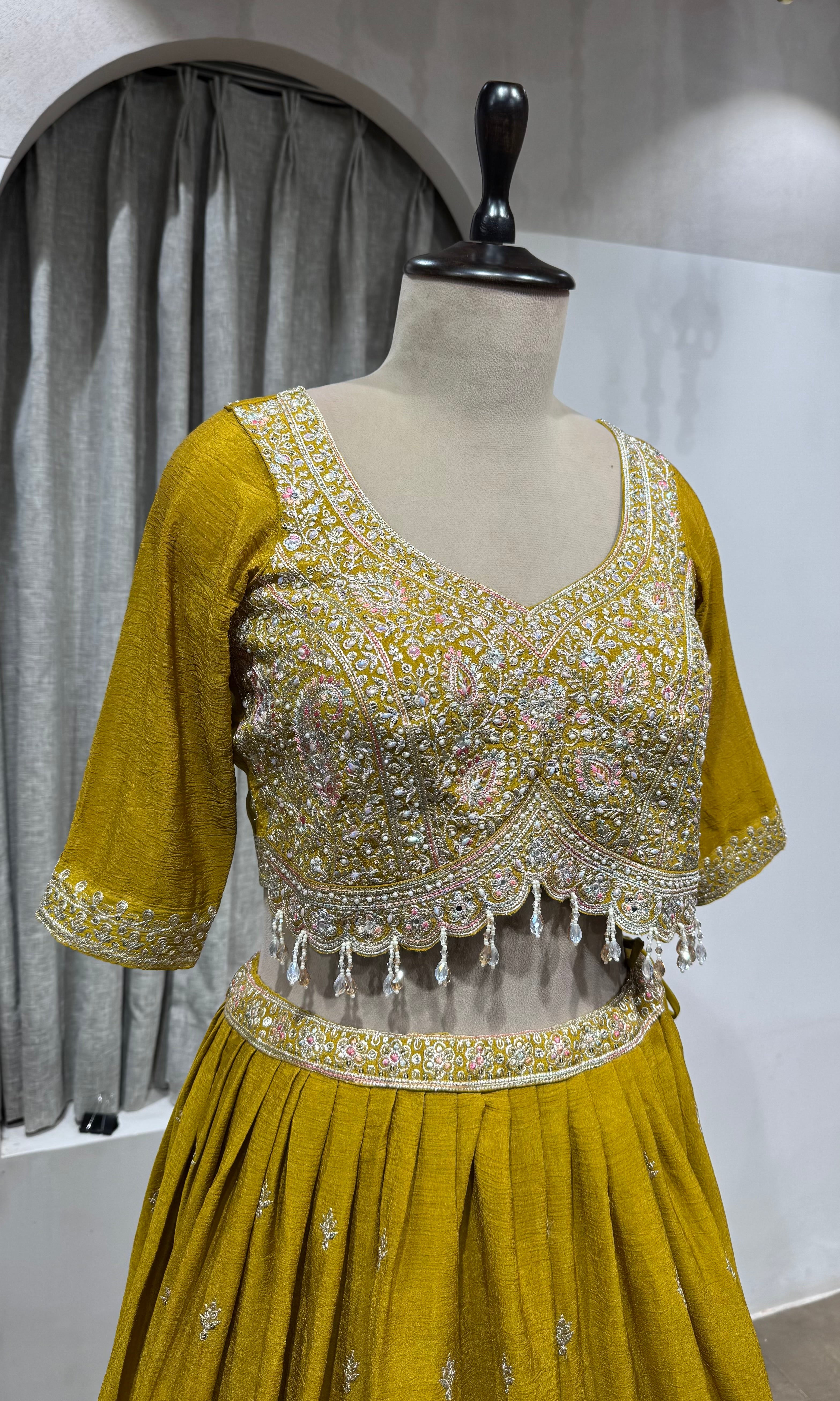 Mustard Flared Lehenga Choli with Border Embroidery