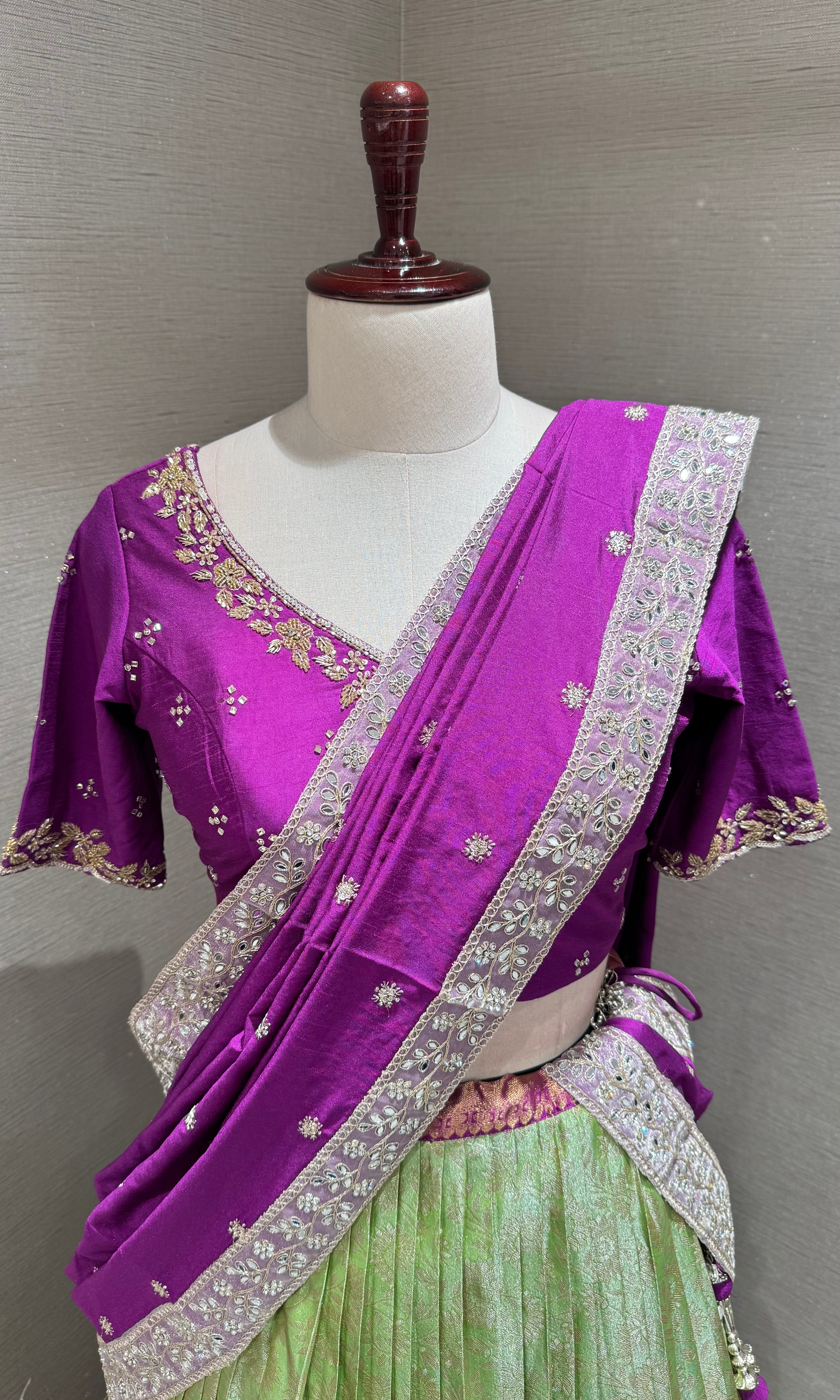 Purple and green banarasi pattu lehenga with embroidered blouse