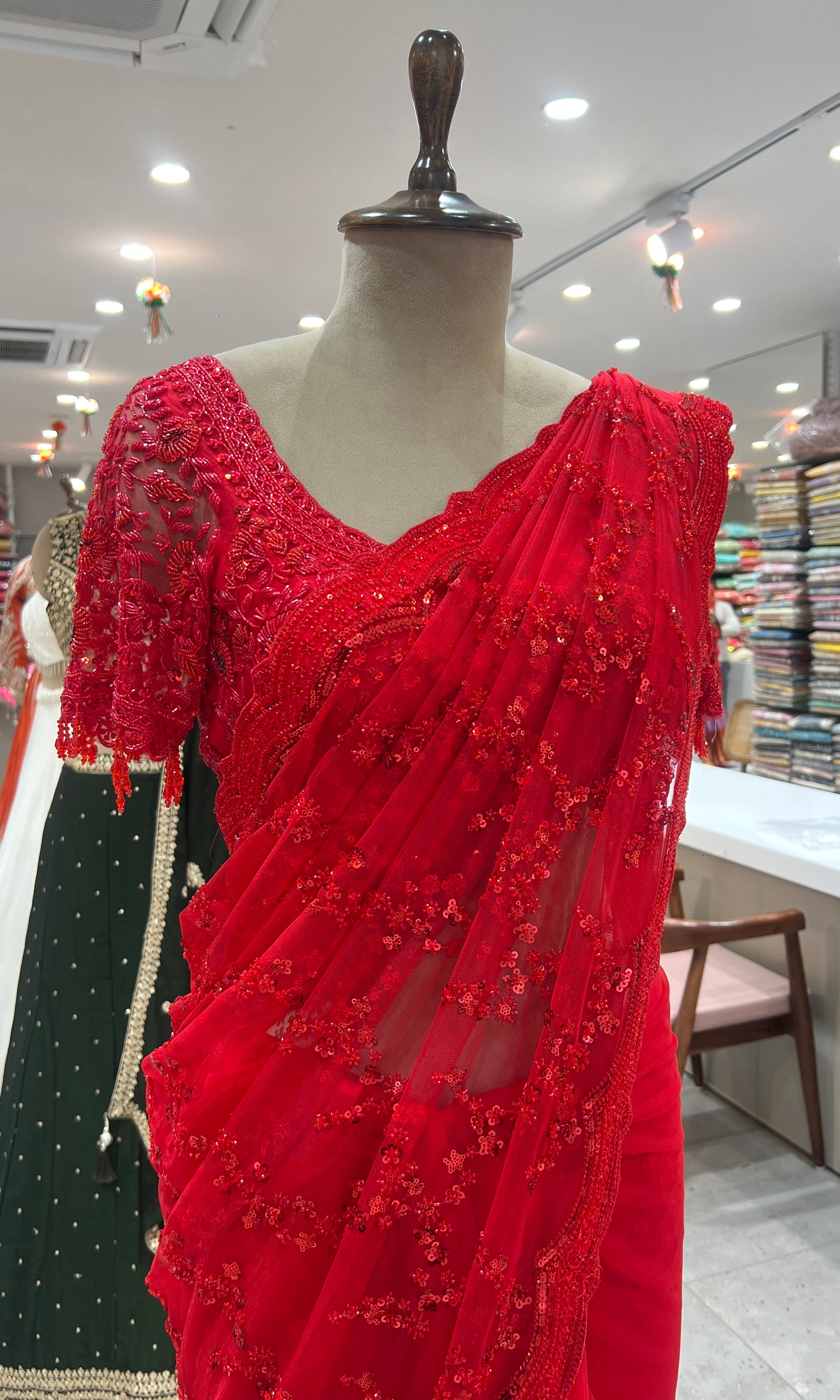 Red designer embellished saree with ready blouse
