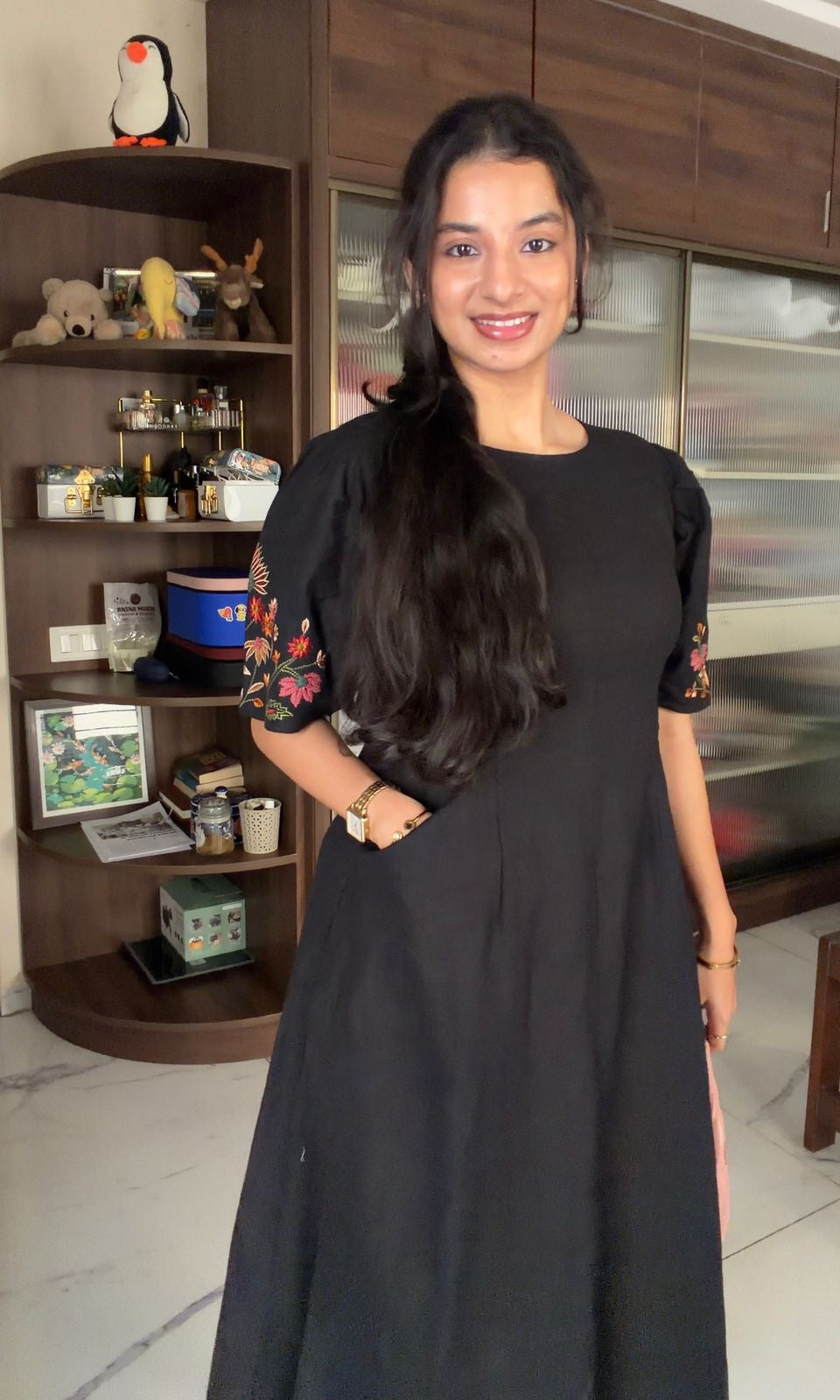 Black dress with embroidered puff sleeves