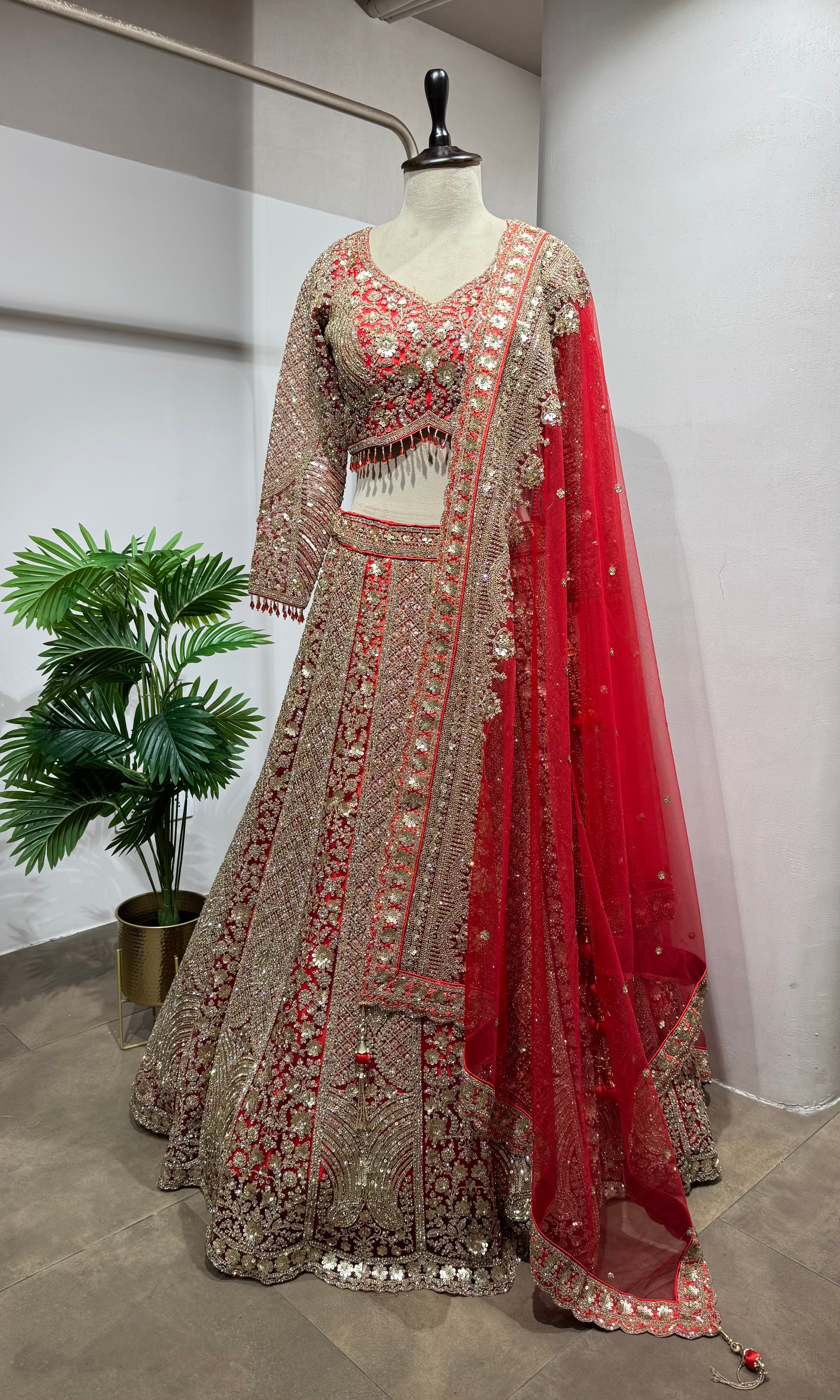 Red golden embroidery bridal lehenga