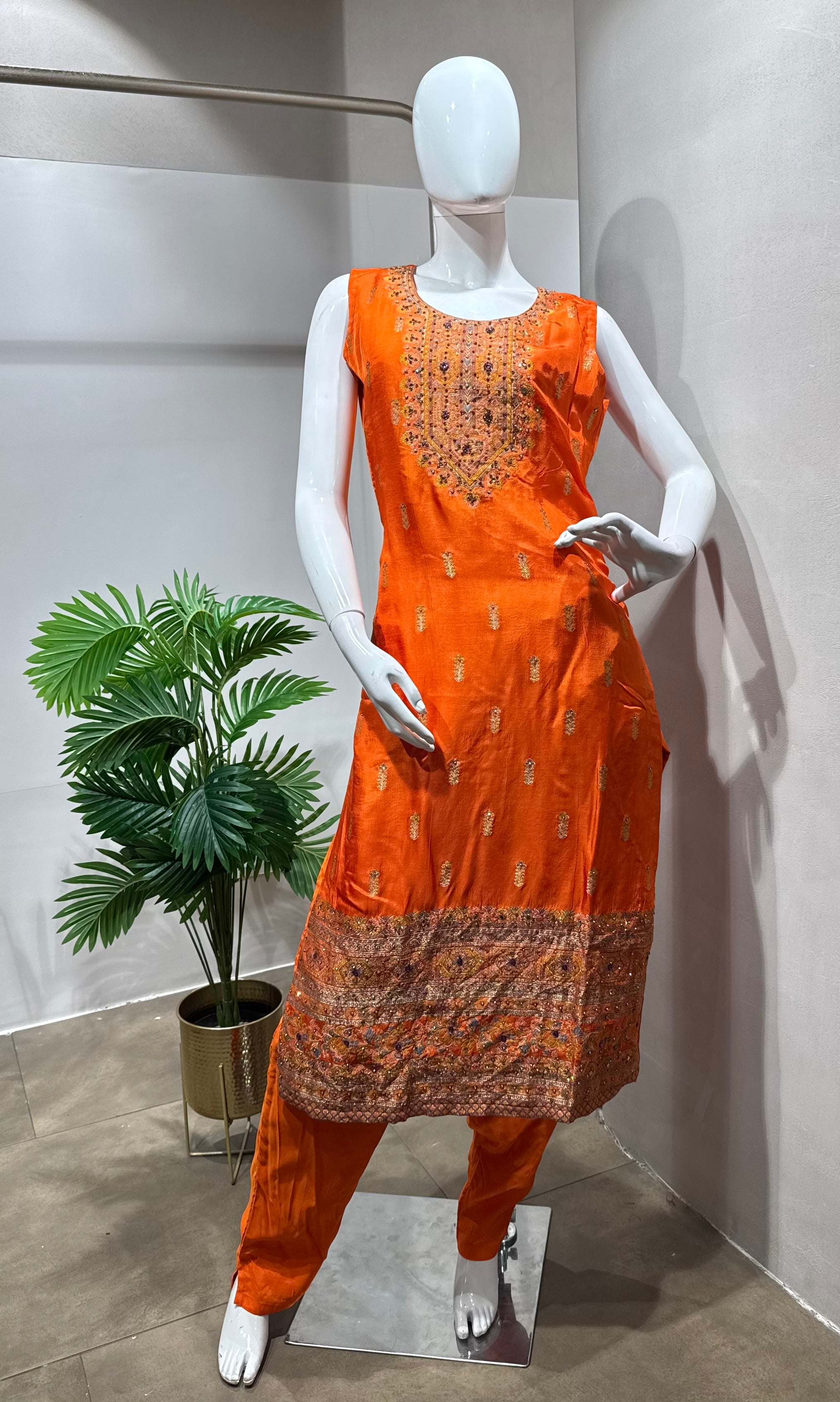 orange and gold embroidered kurta set
