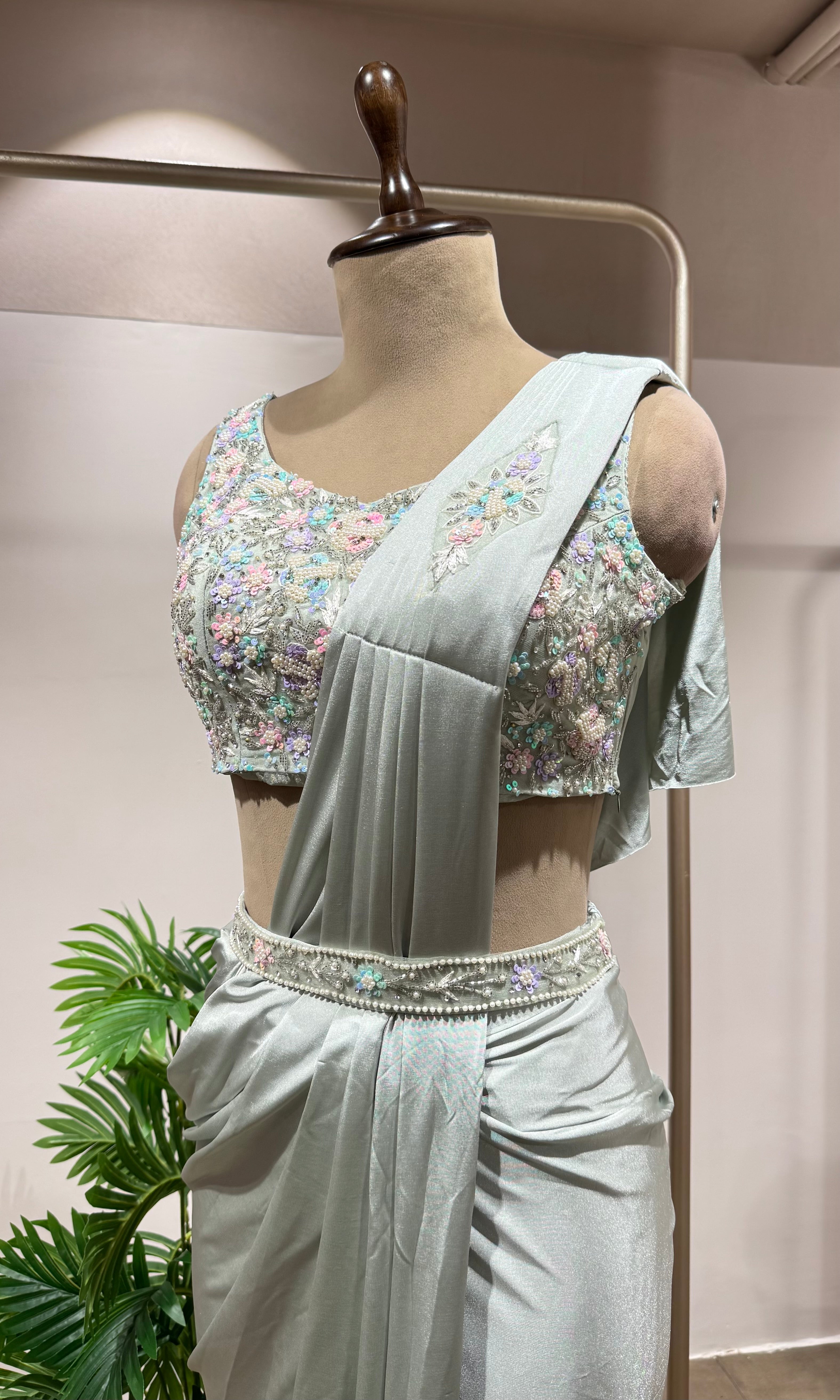 GREEN DRAPE SAREE WITH EMBELLISHED BLOUSE