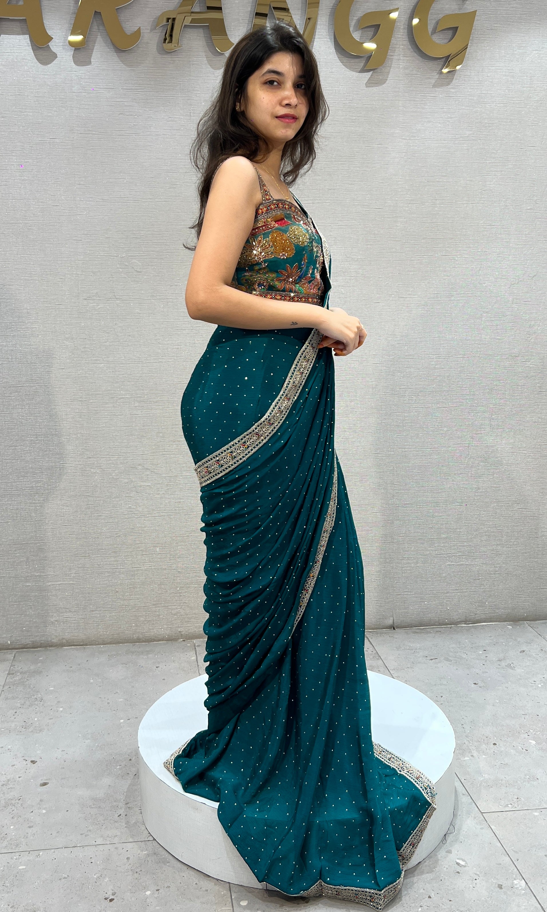 Rama green drape Saree with Intricate Floral Blouse