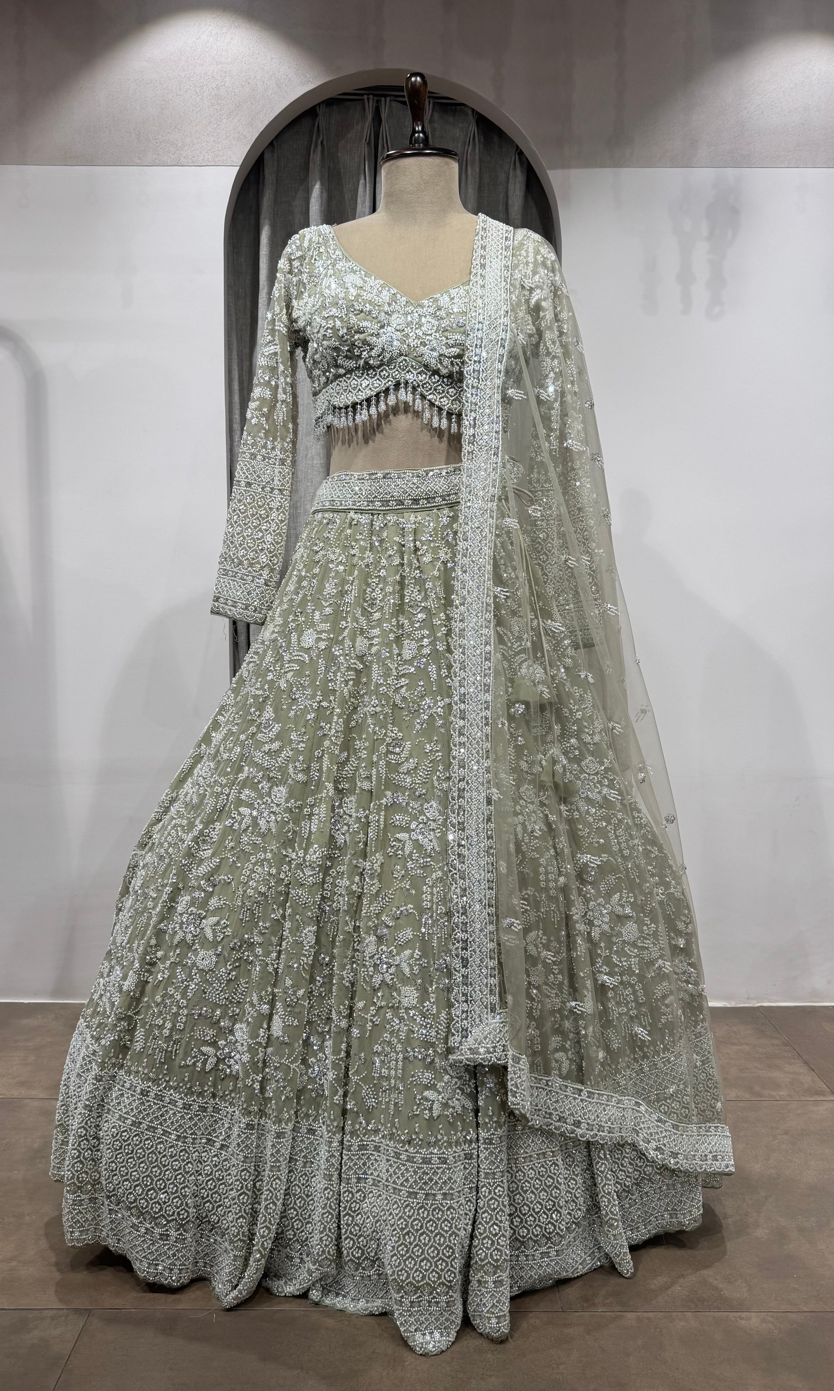 Sage Green Heavily Embroidered Net Bridal Lehenga