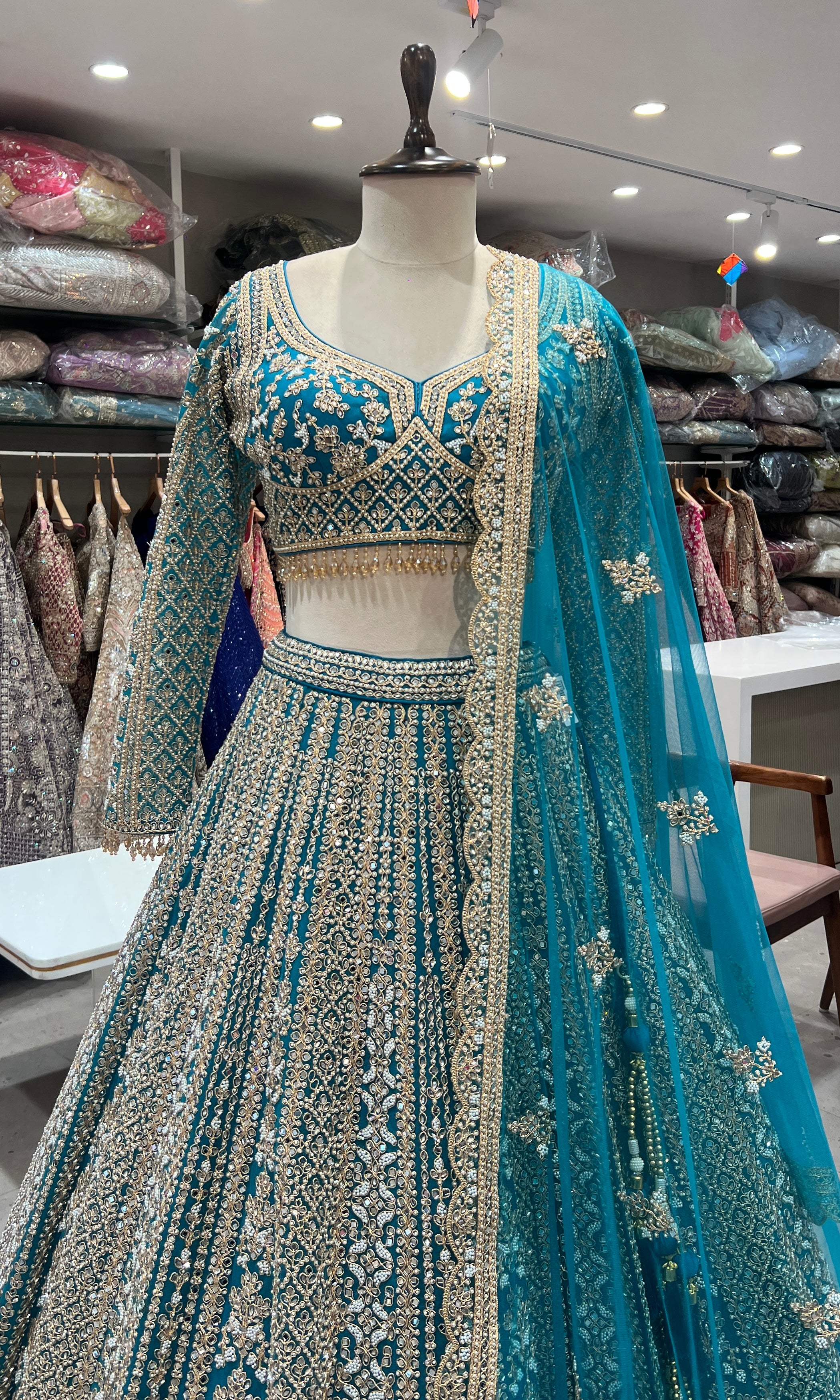 blue intricate golden embroidery lehenga