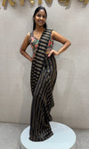 Black and silver striped drape saree with intricate blouse