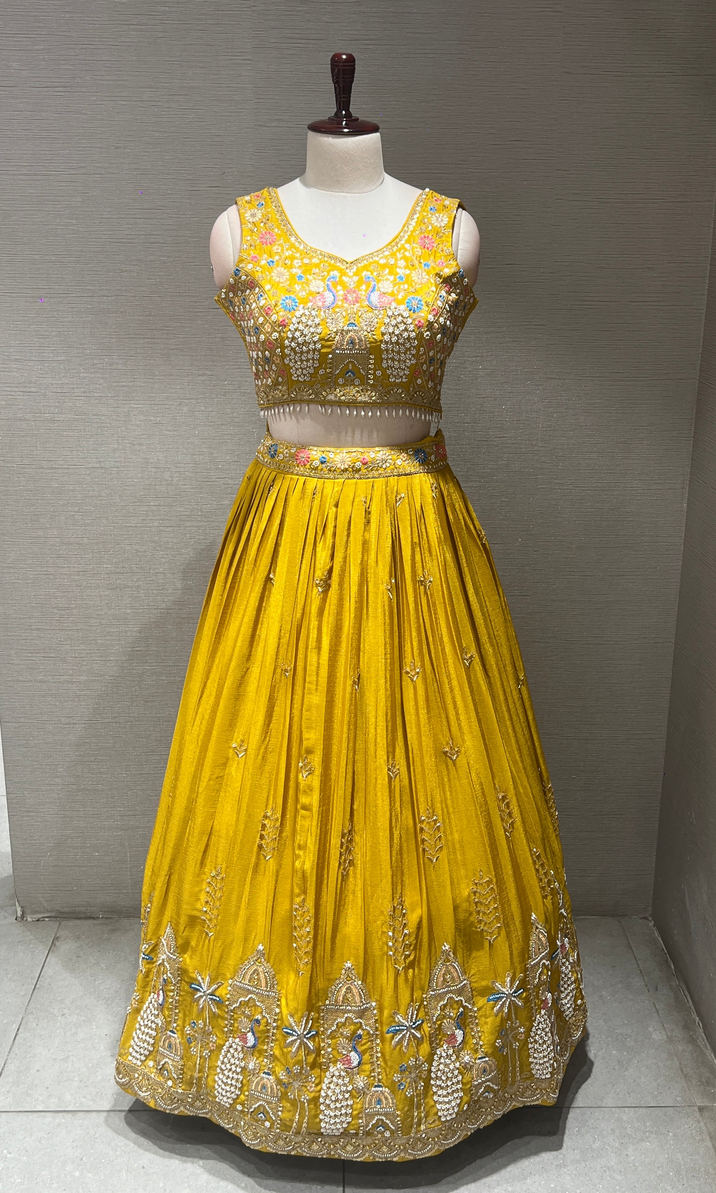 Yellow peacock embroidered Lehenga