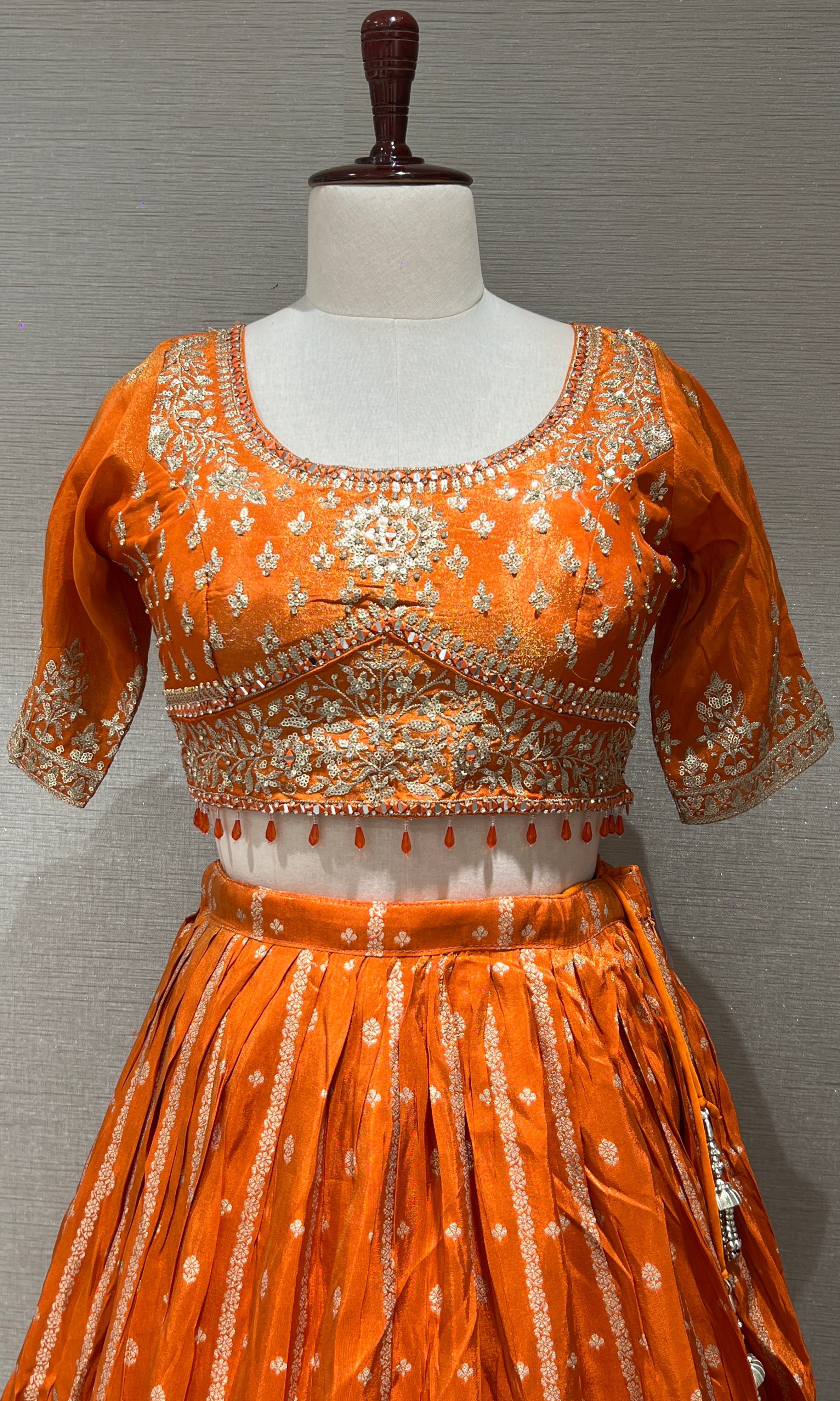 Orange Lehenga with Golden embroidery