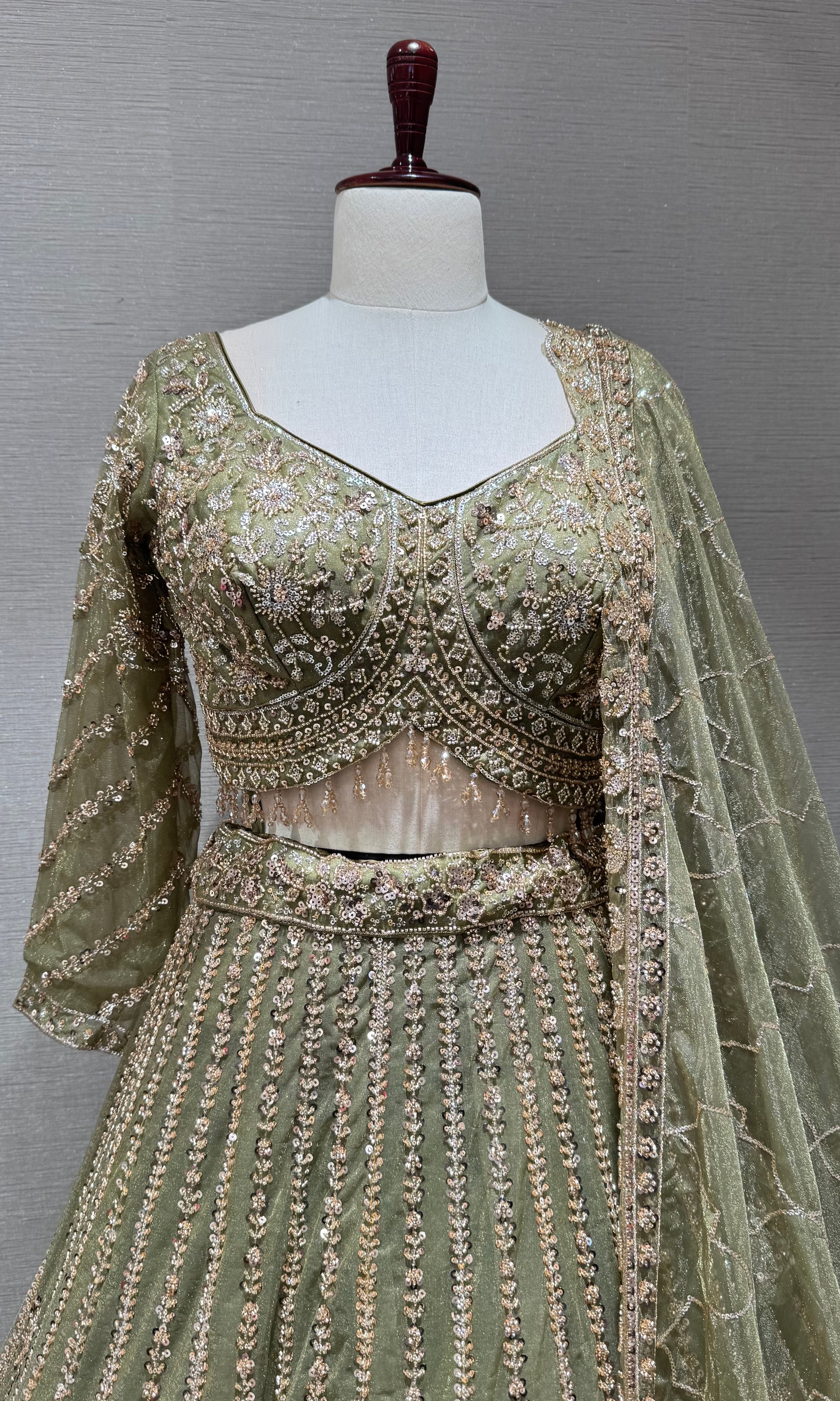 Green intricate embroidered lehenga set