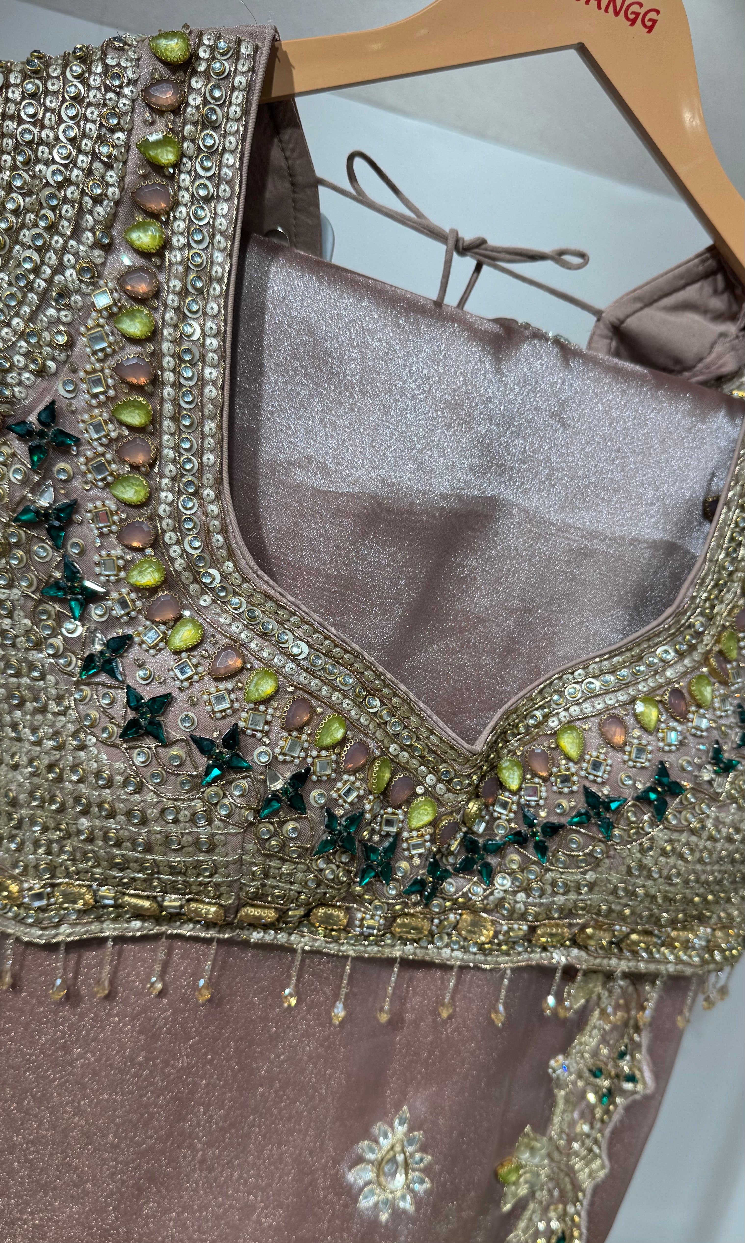 Onion pink Shimmer Saree with Multi-Stone Blouse