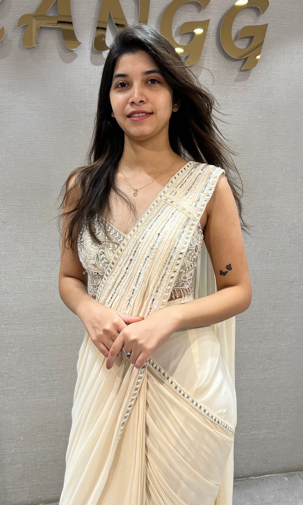 Ivory silk Draped Saree with Embellished Corset Blouse