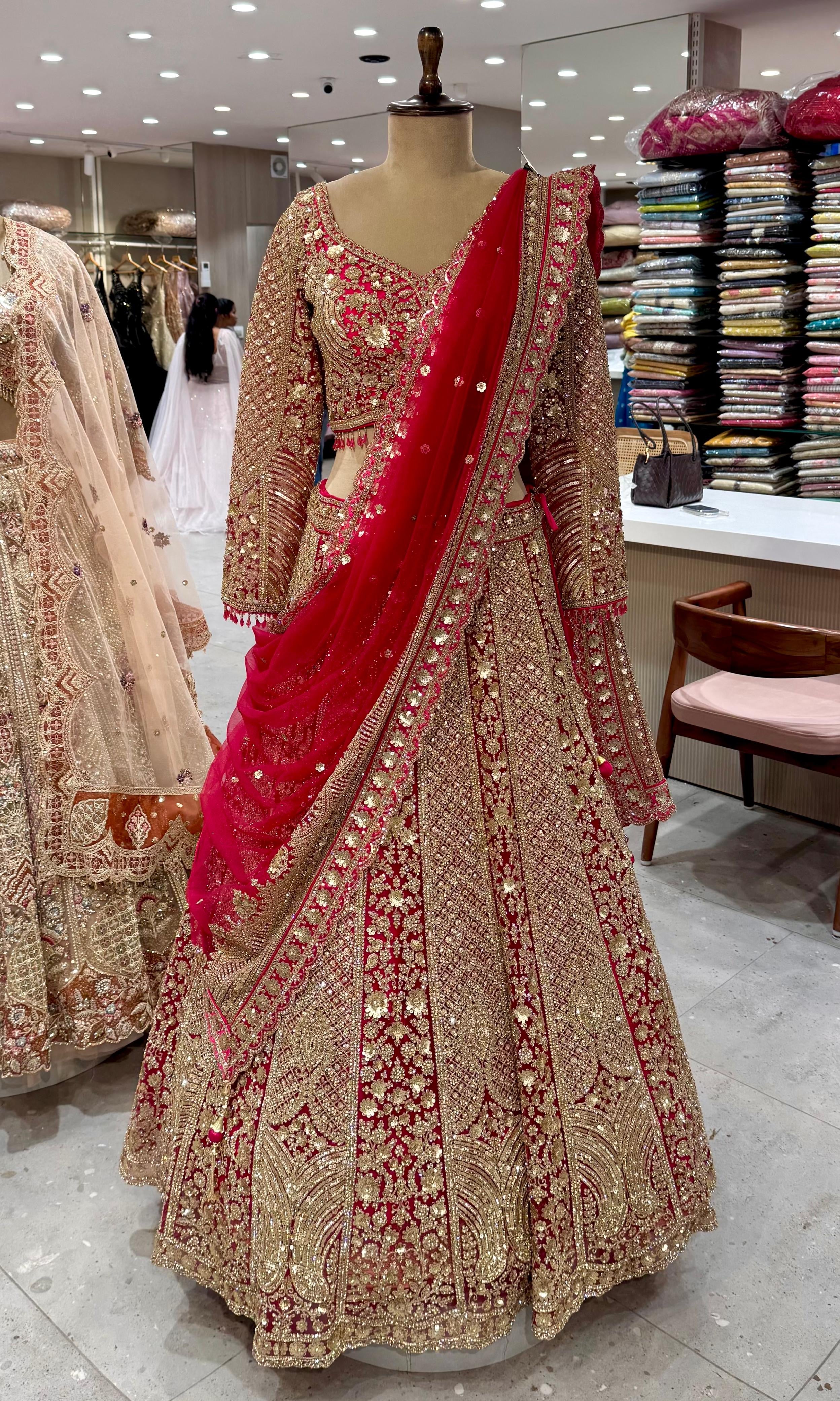 Pink Lehenga with Intricate Gold Detailing