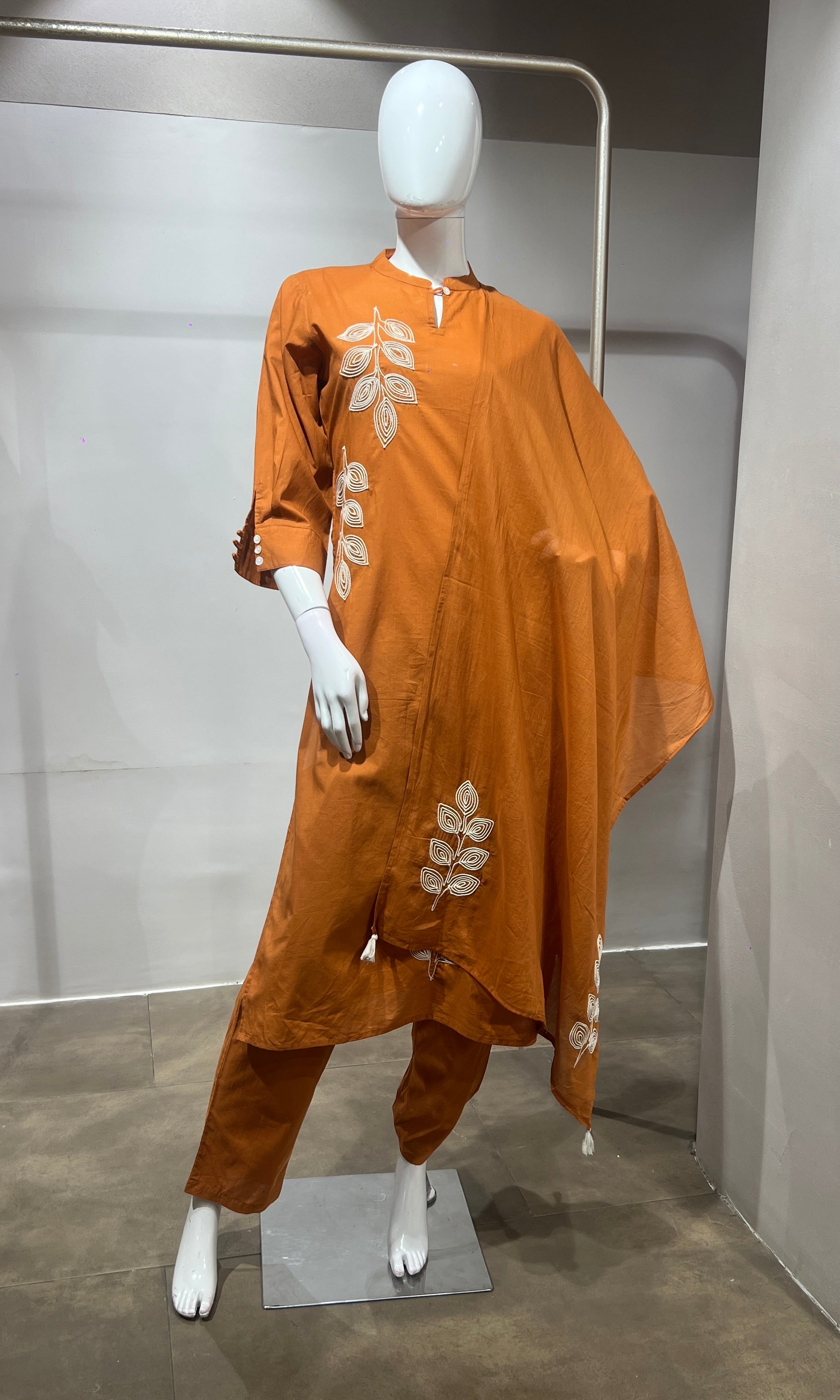 Orange leaf cotton kurta set with tassal dupatta