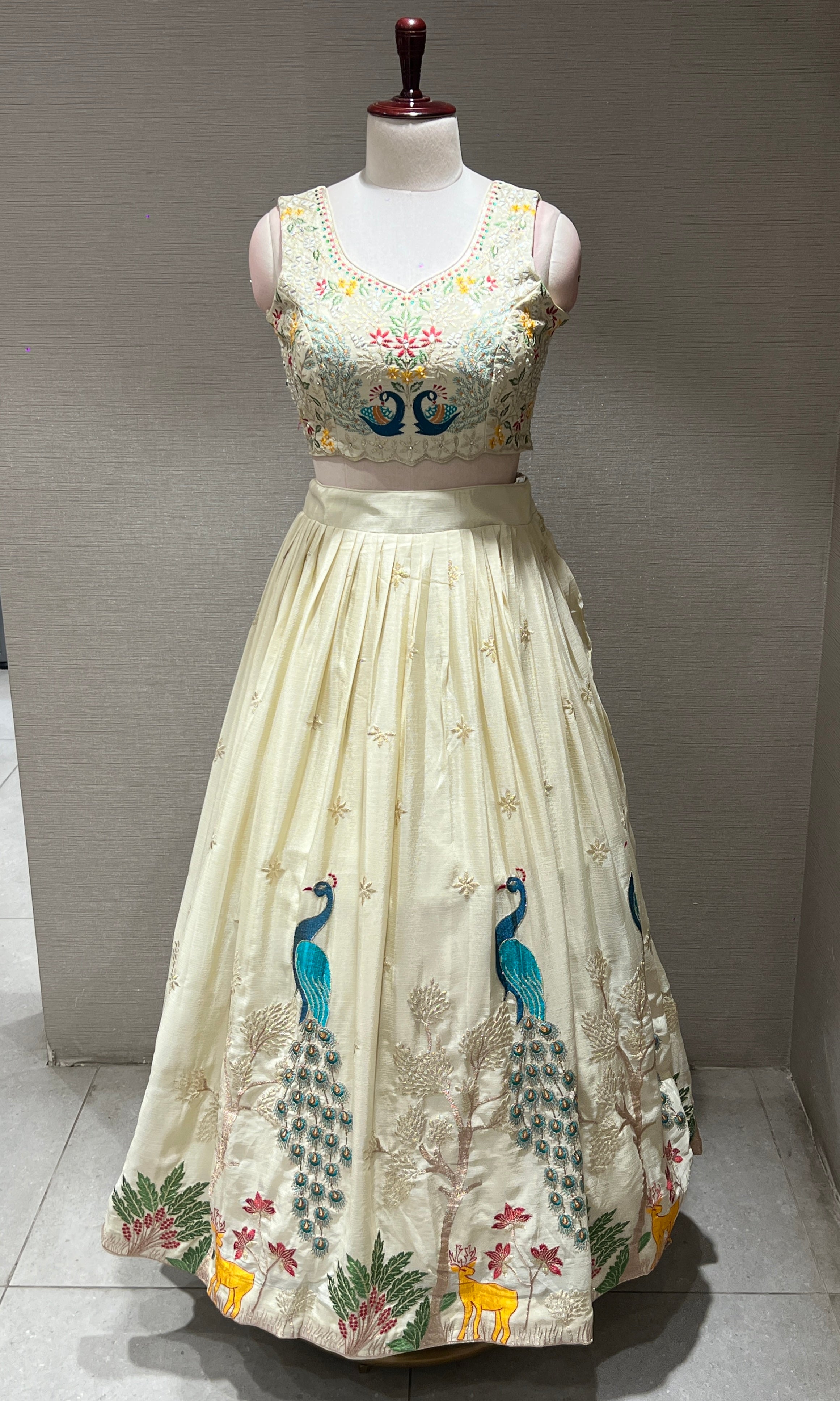 Cream Lehenga WITH PEACOCK DESIGN
