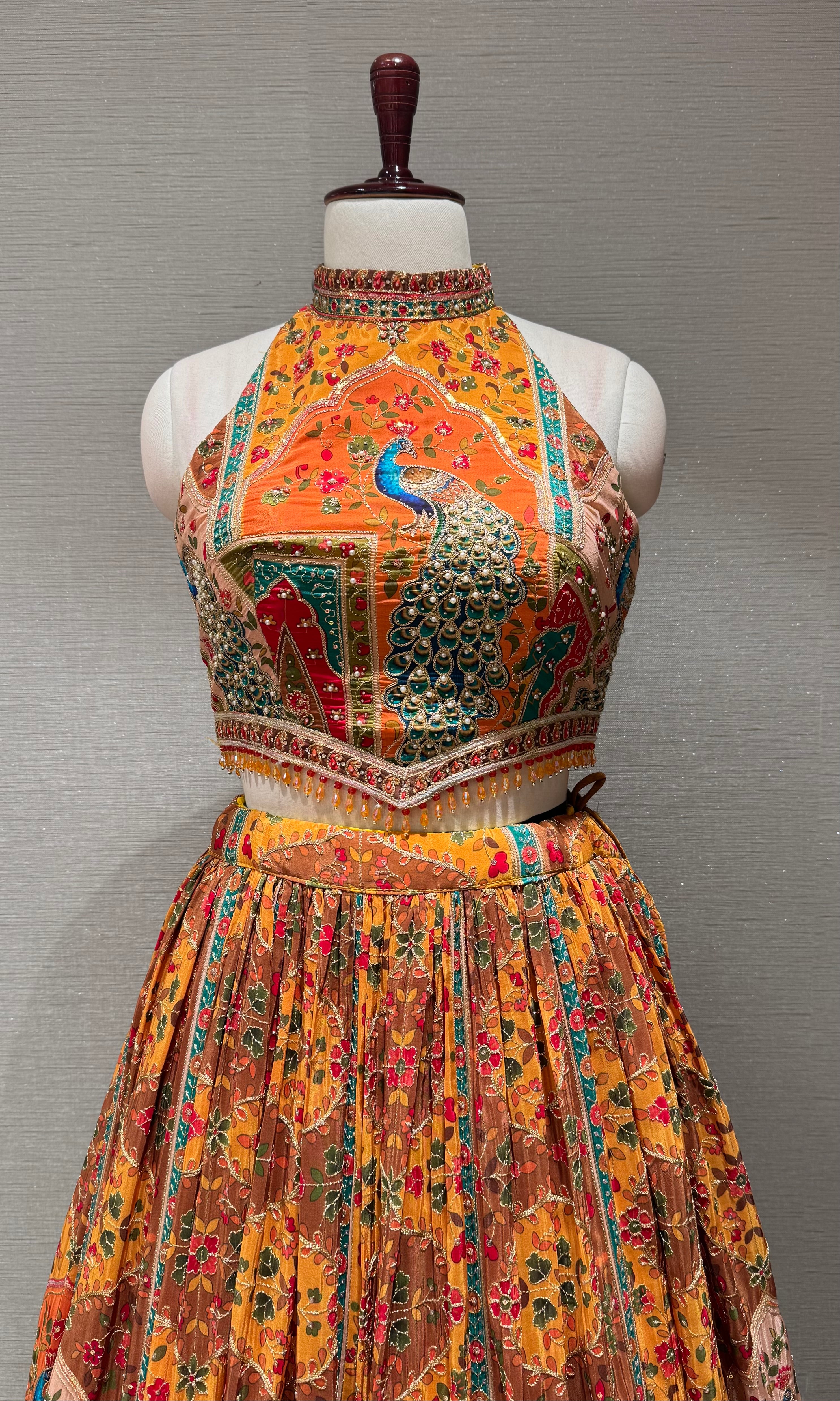 Mustard Mayur Pichwai halter neck Lehenga set
