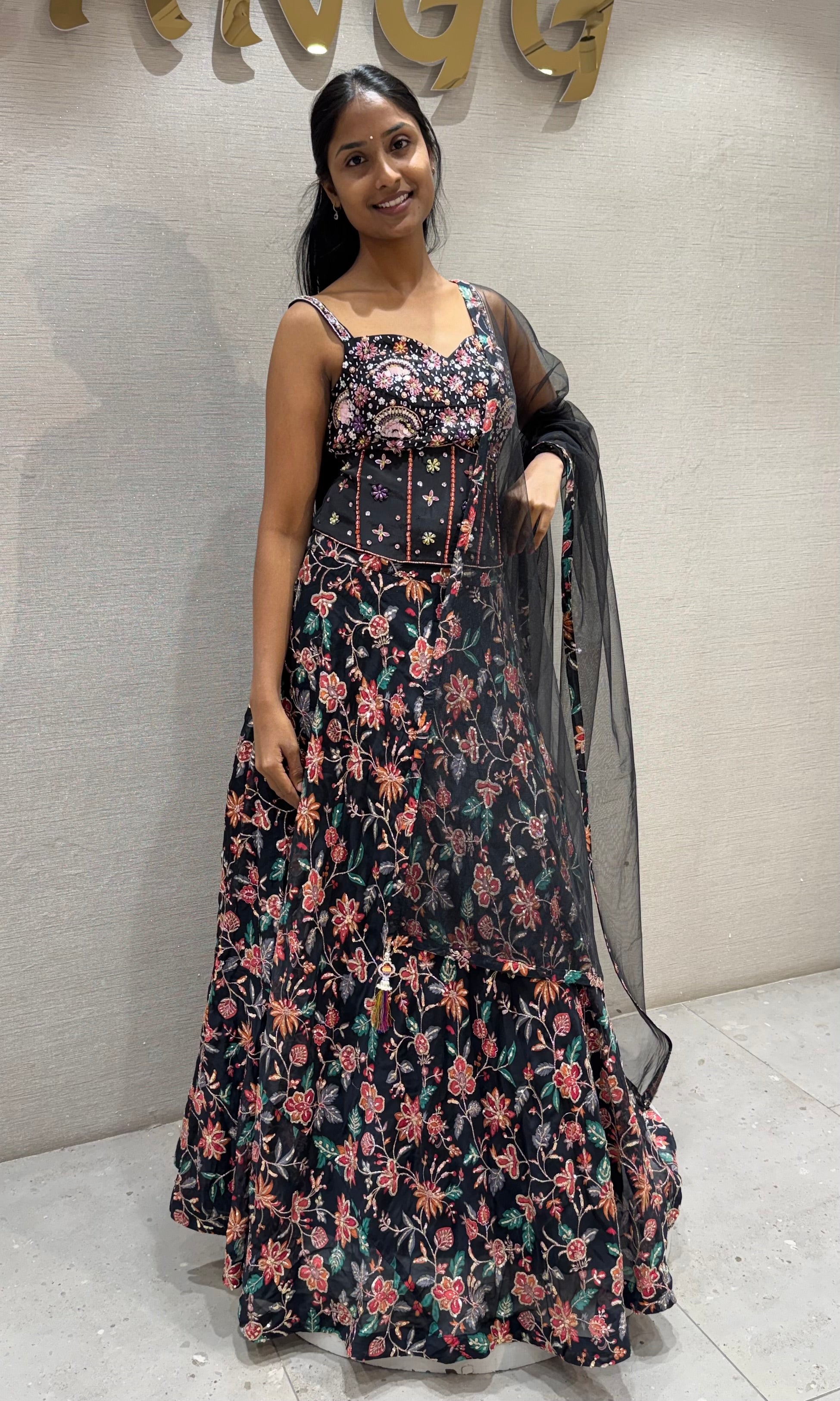 black floral printed lehenga set with corset blouse