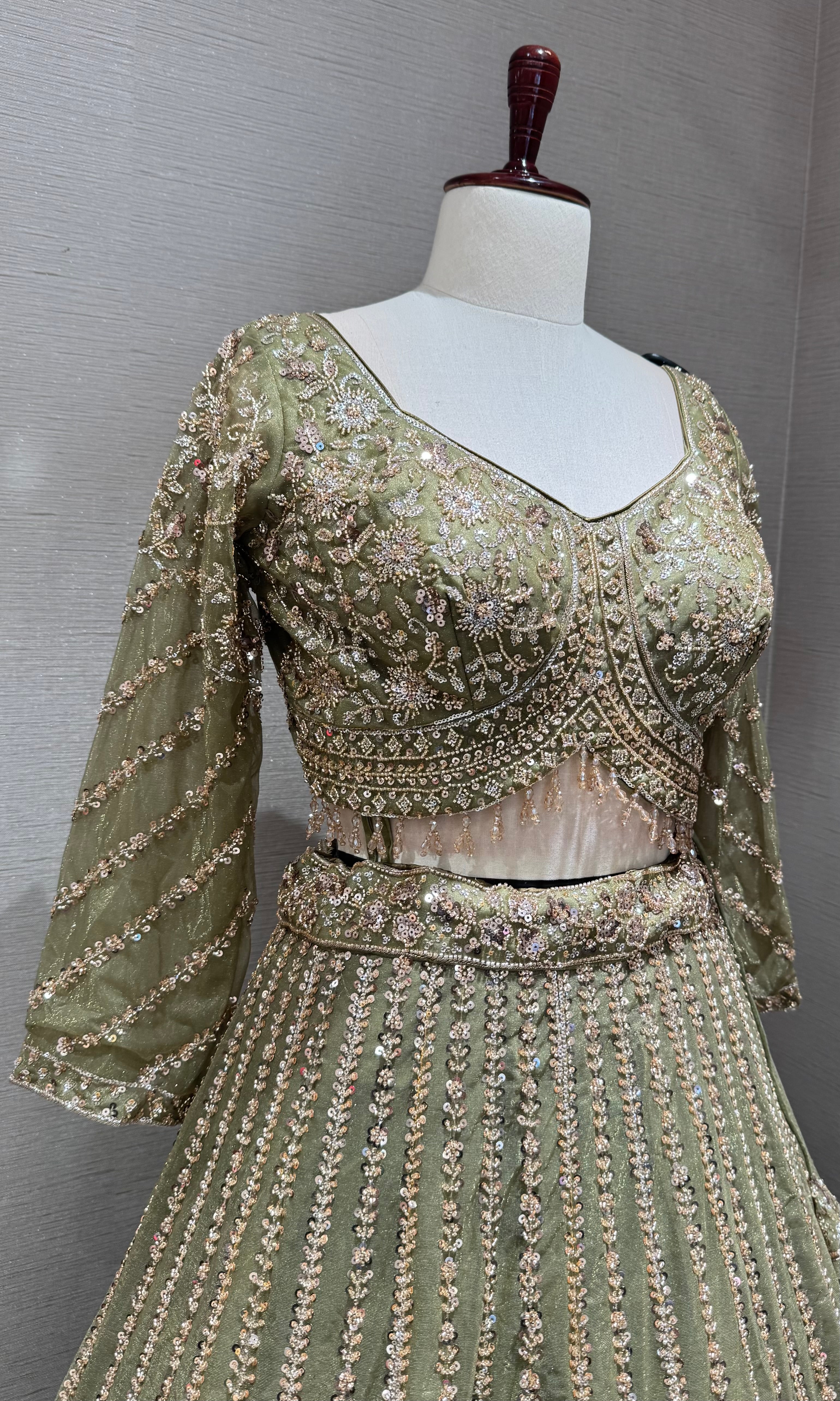 Green intricate embroidered lehenga set