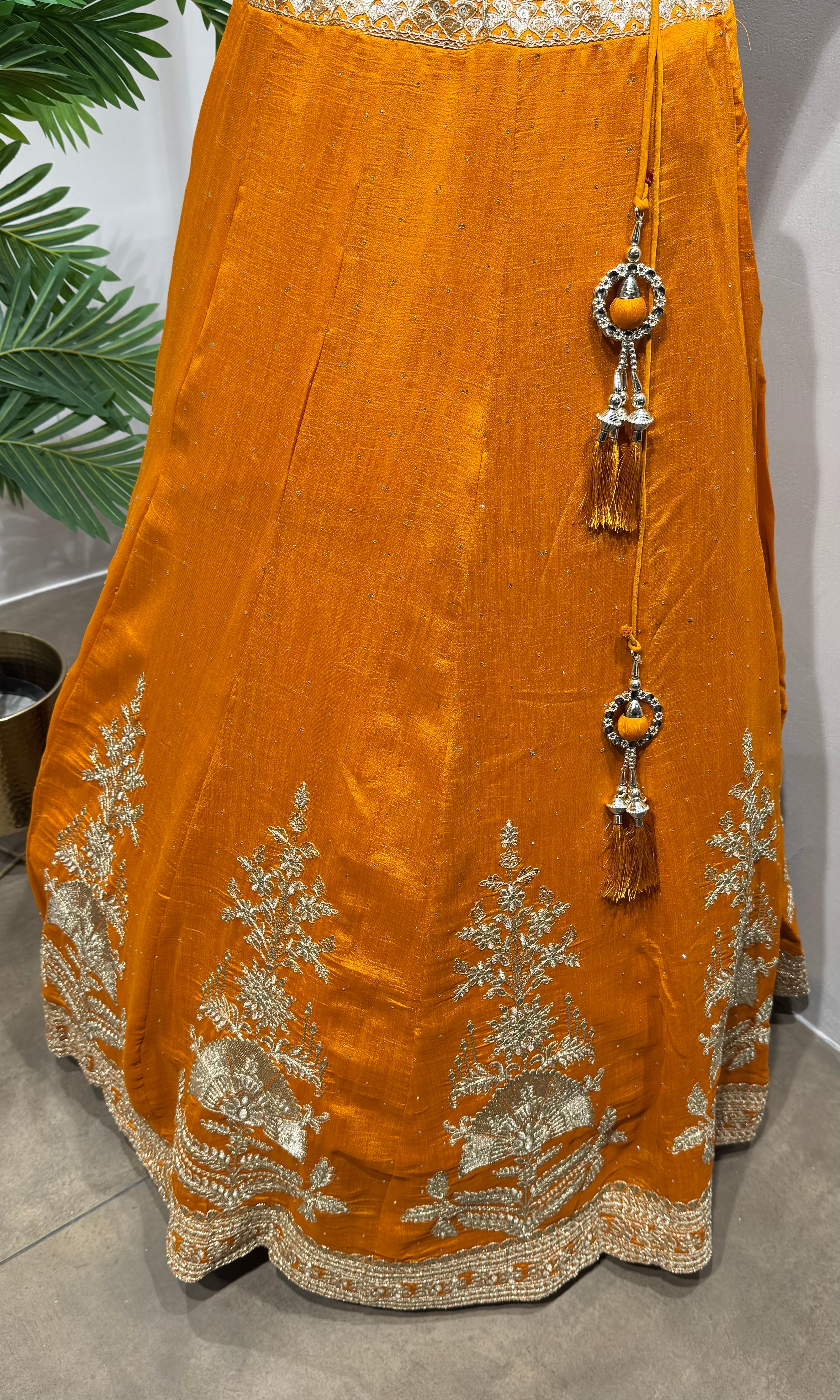orange silk lehenga set with gold embroidery