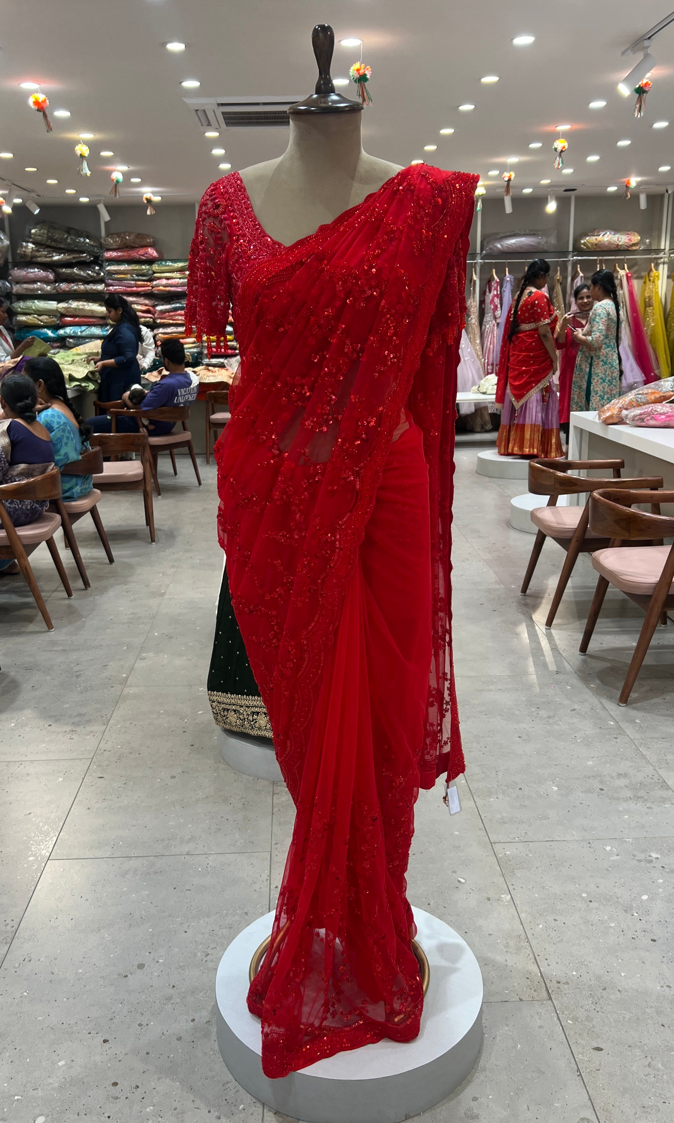 Red designer embellished saree with ready blouse