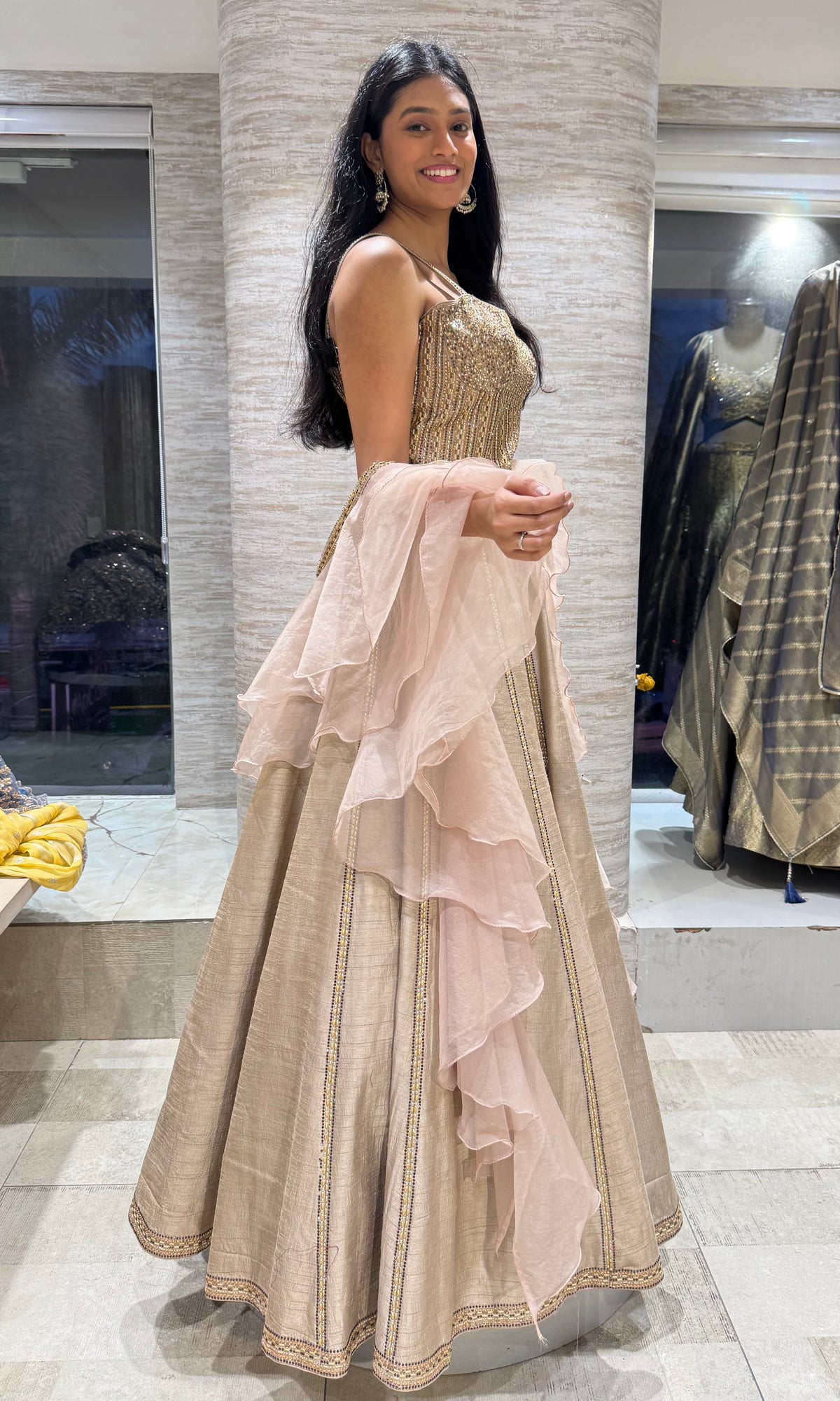 Champagne Shimmer corset lehenga with Ruffled Organza Cape Dupatta