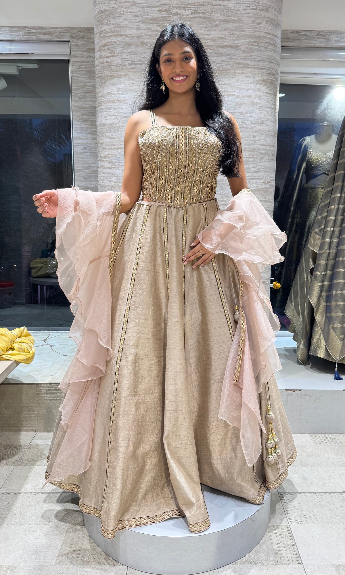 Champagne Shimmer corset lehenga with Ruffled Organza Cape Dupatta